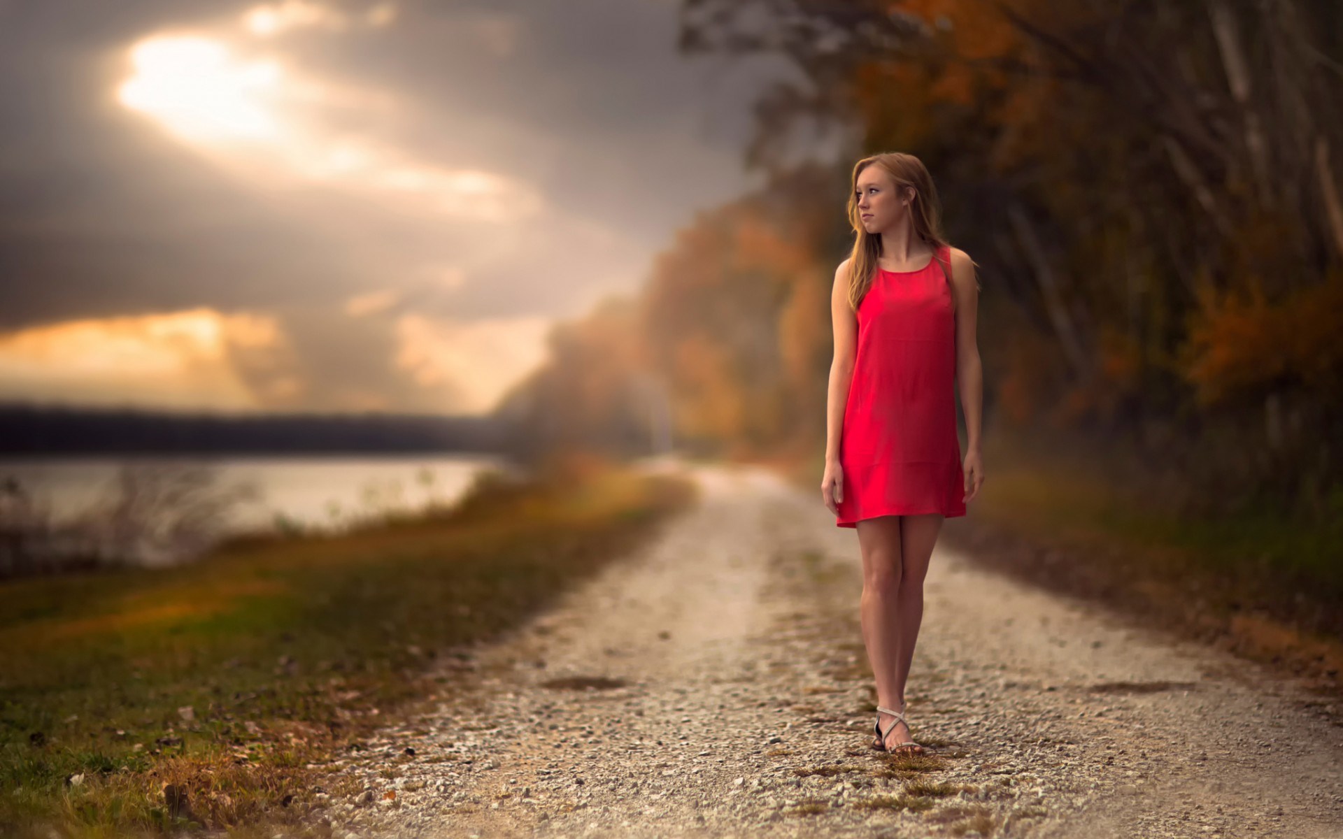 Woman in red dress walking on a path HD Wallpaper