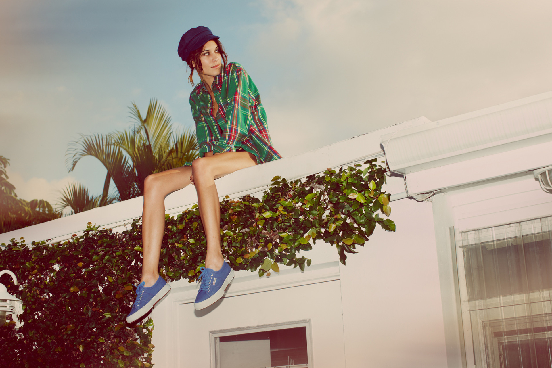 Alexa Chung sitting on a roof HD Wallpaper