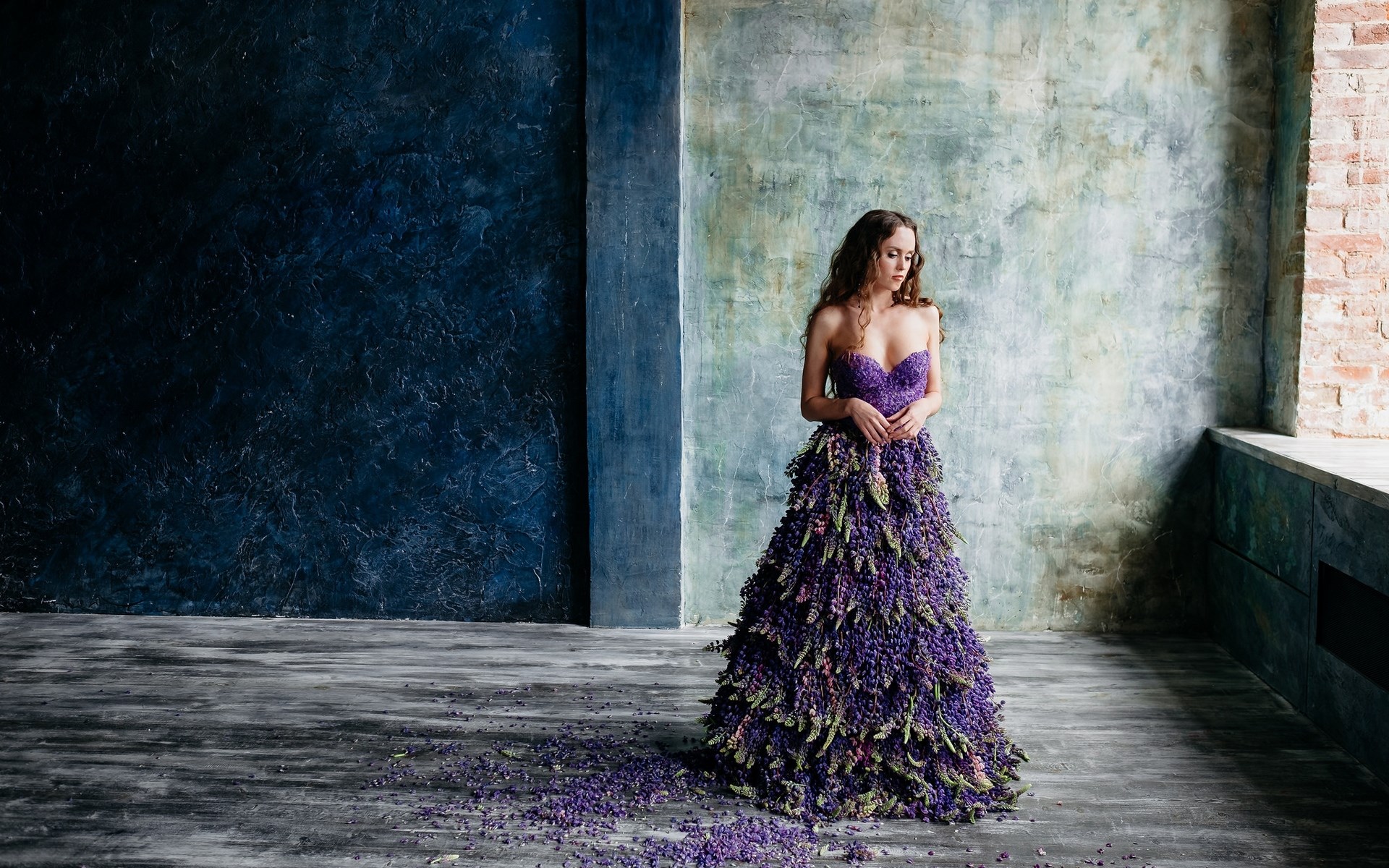 Woman in a floral dress with scattered petals HD Wallpaper