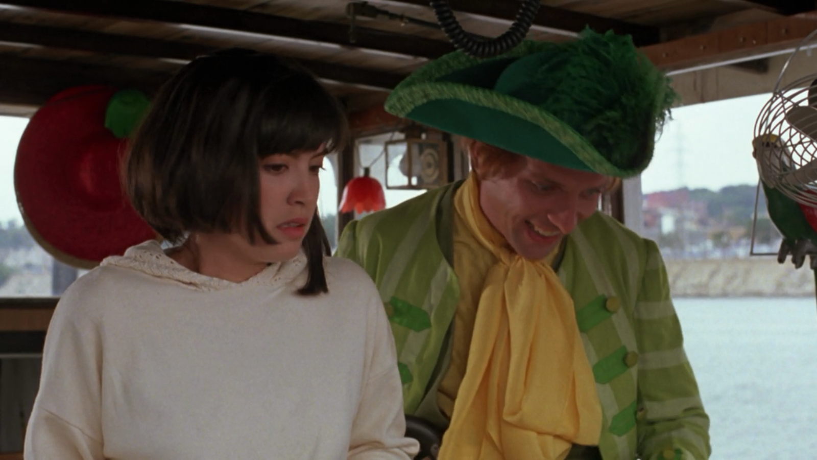 Rik Mayall in costume on a boat HD Wallpaper