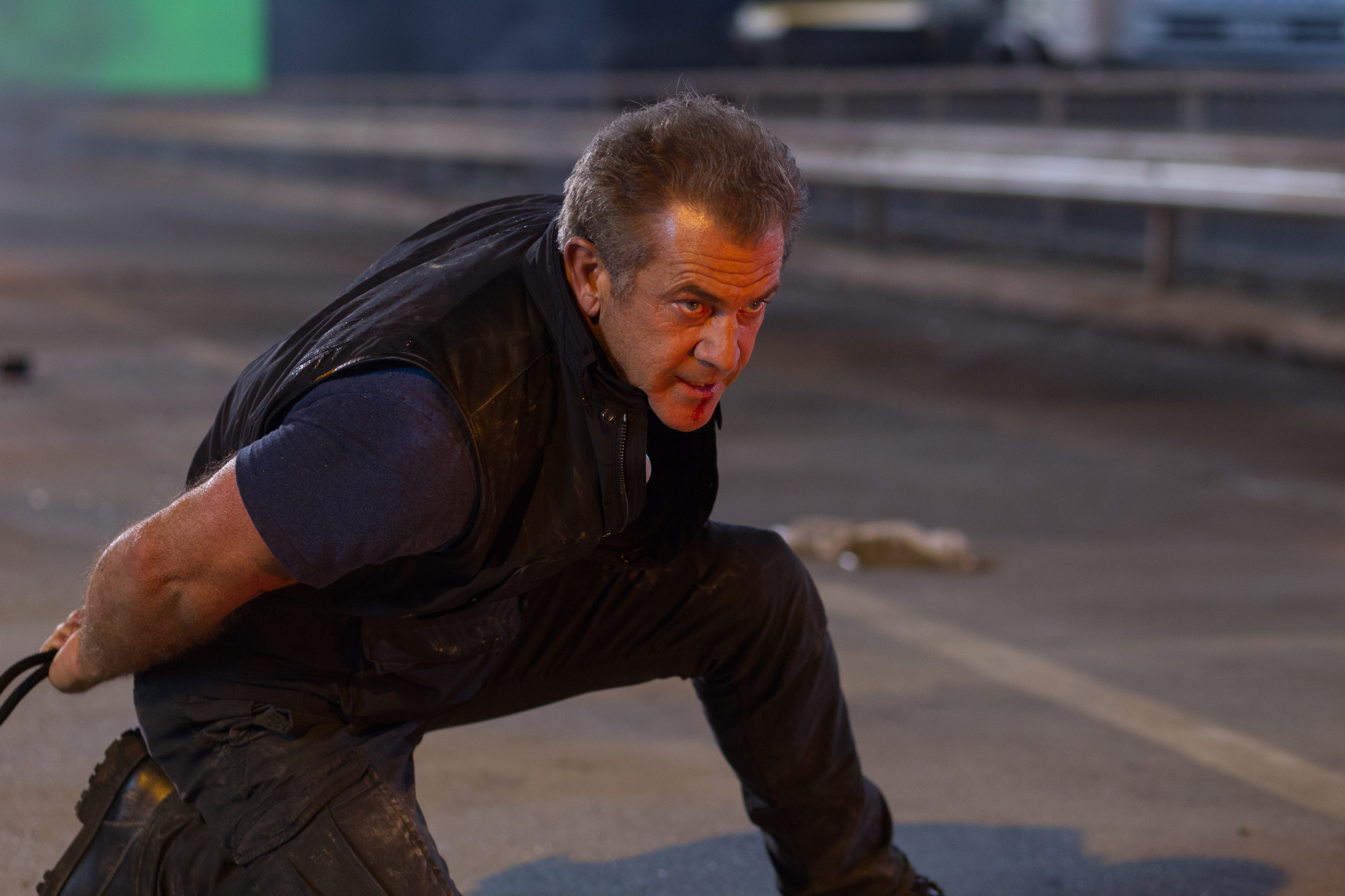 Mel Gibson in a dark vest and pants HD Wallpaper
