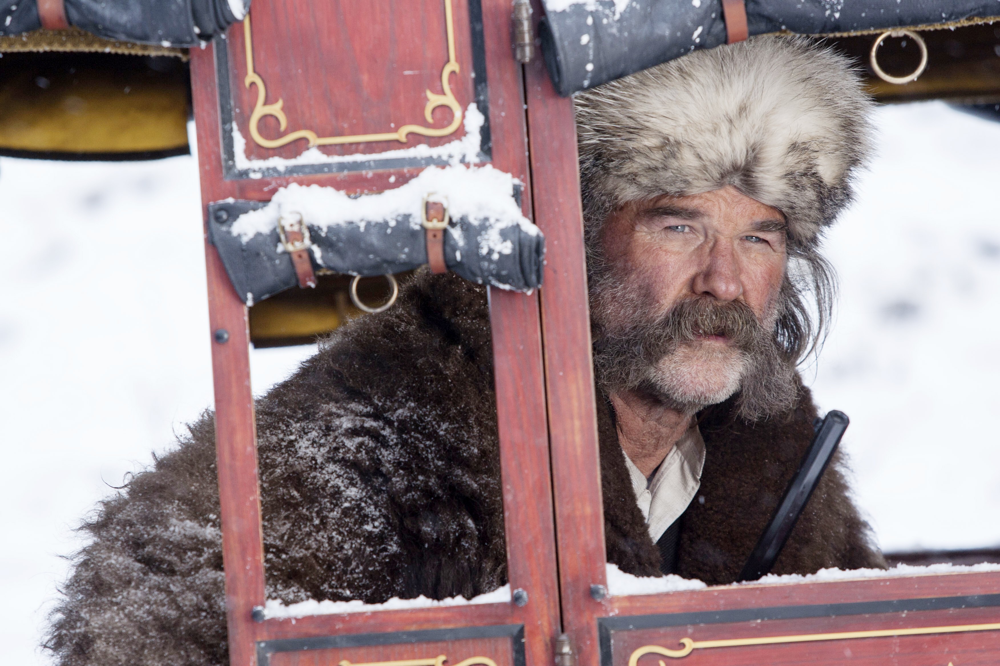 Kurt Russell in a horse-drawn carriage HD Wallpaper