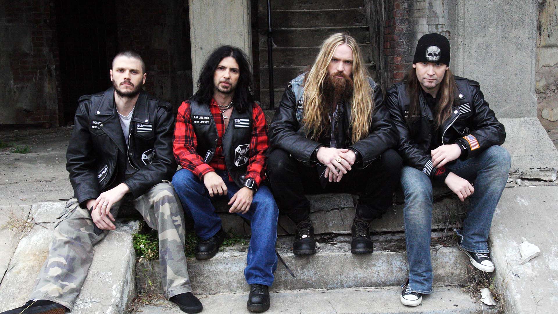 Zakk Wylde and band members on steps HD Wallpaper