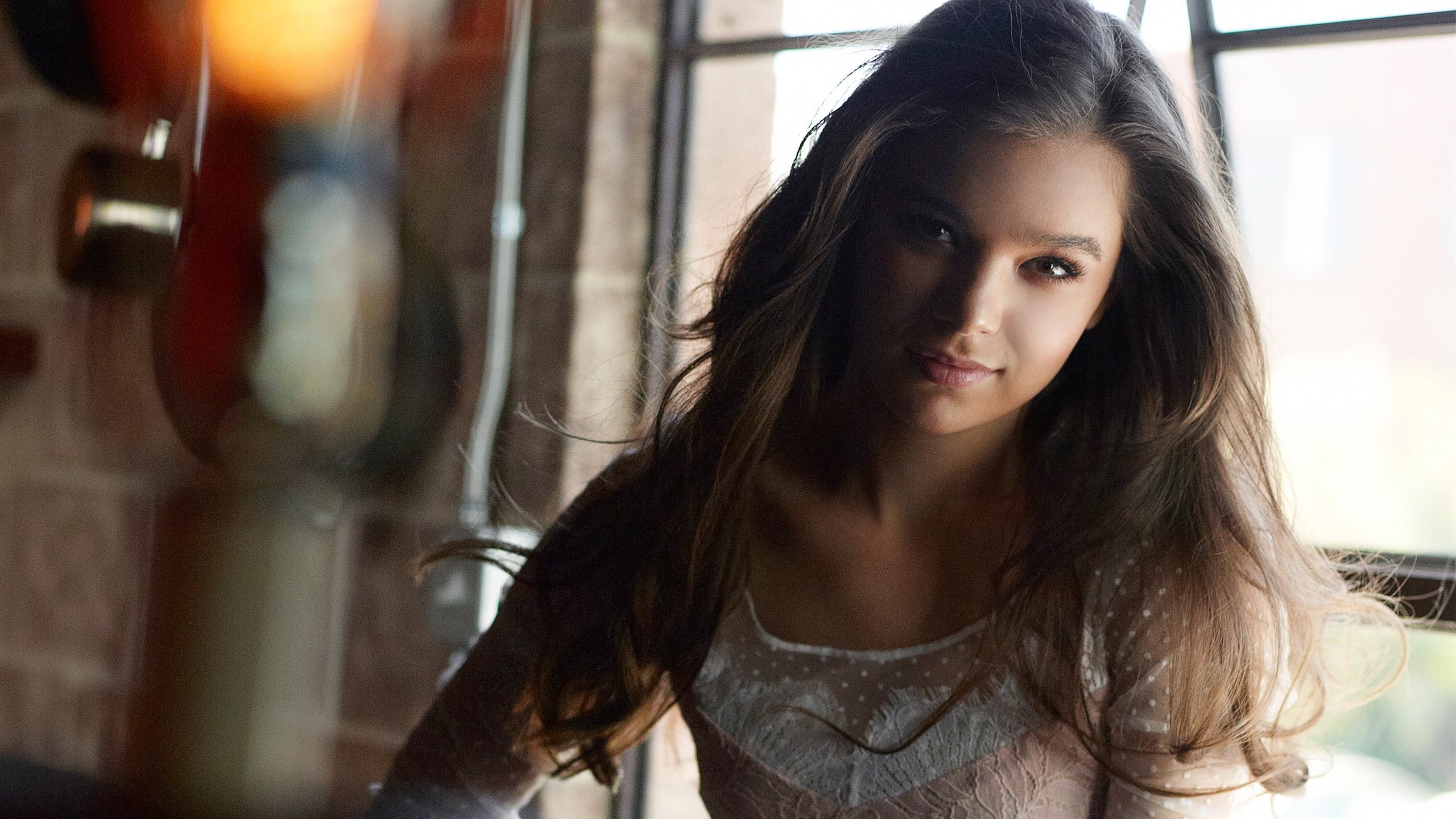 Hailee Steinfeld posing by a window HD Wallpaper