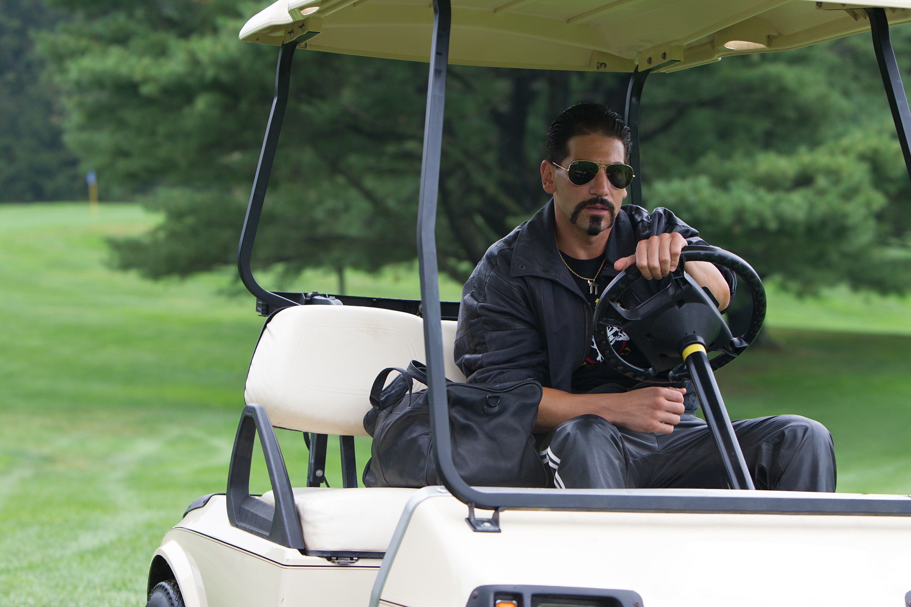 Jon Bernthal driving a golf cart HD Wallpaper