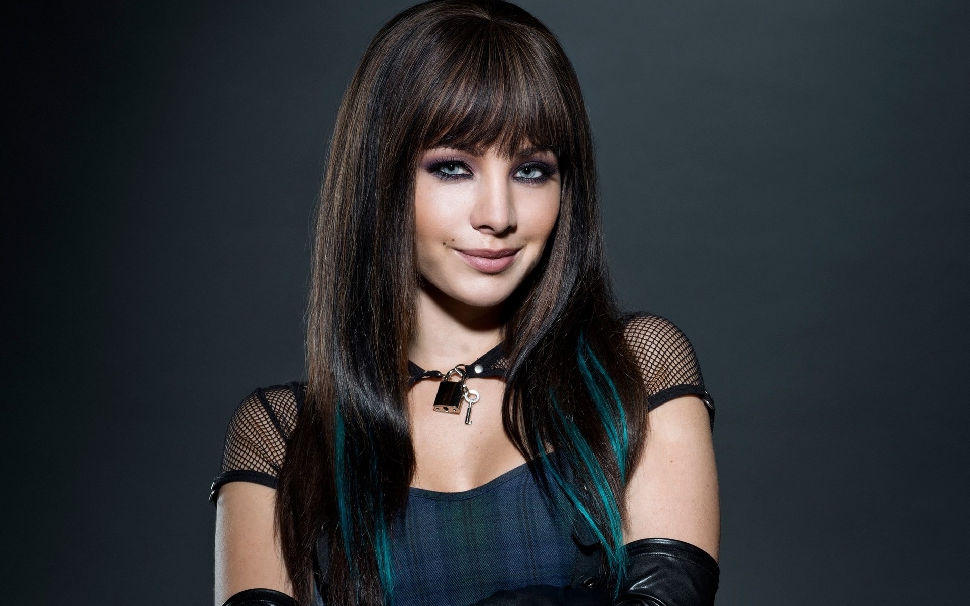Woman with dark hair and blue streaks HD Wallpaper
