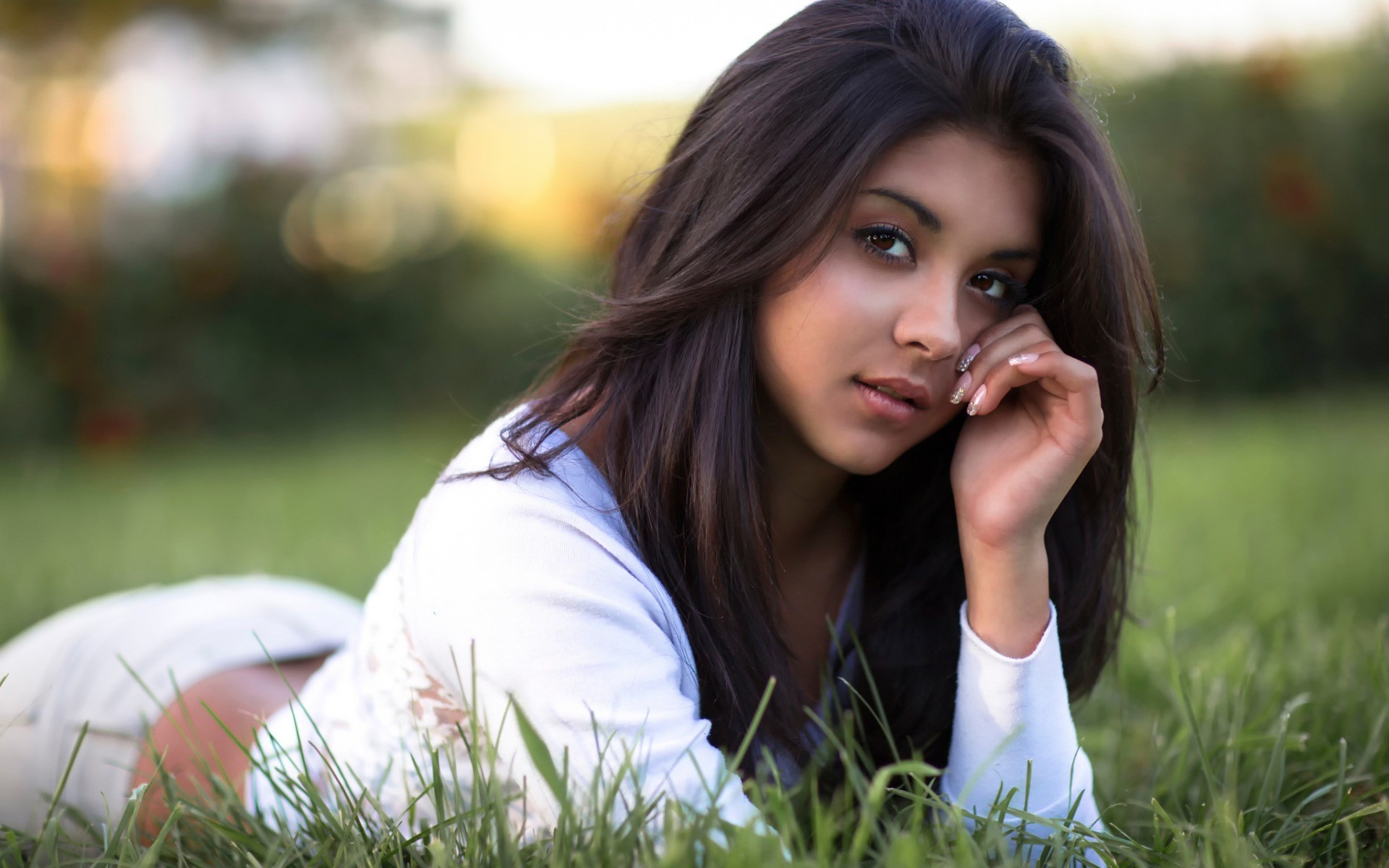 Woman lying in grass HD Wallpaper