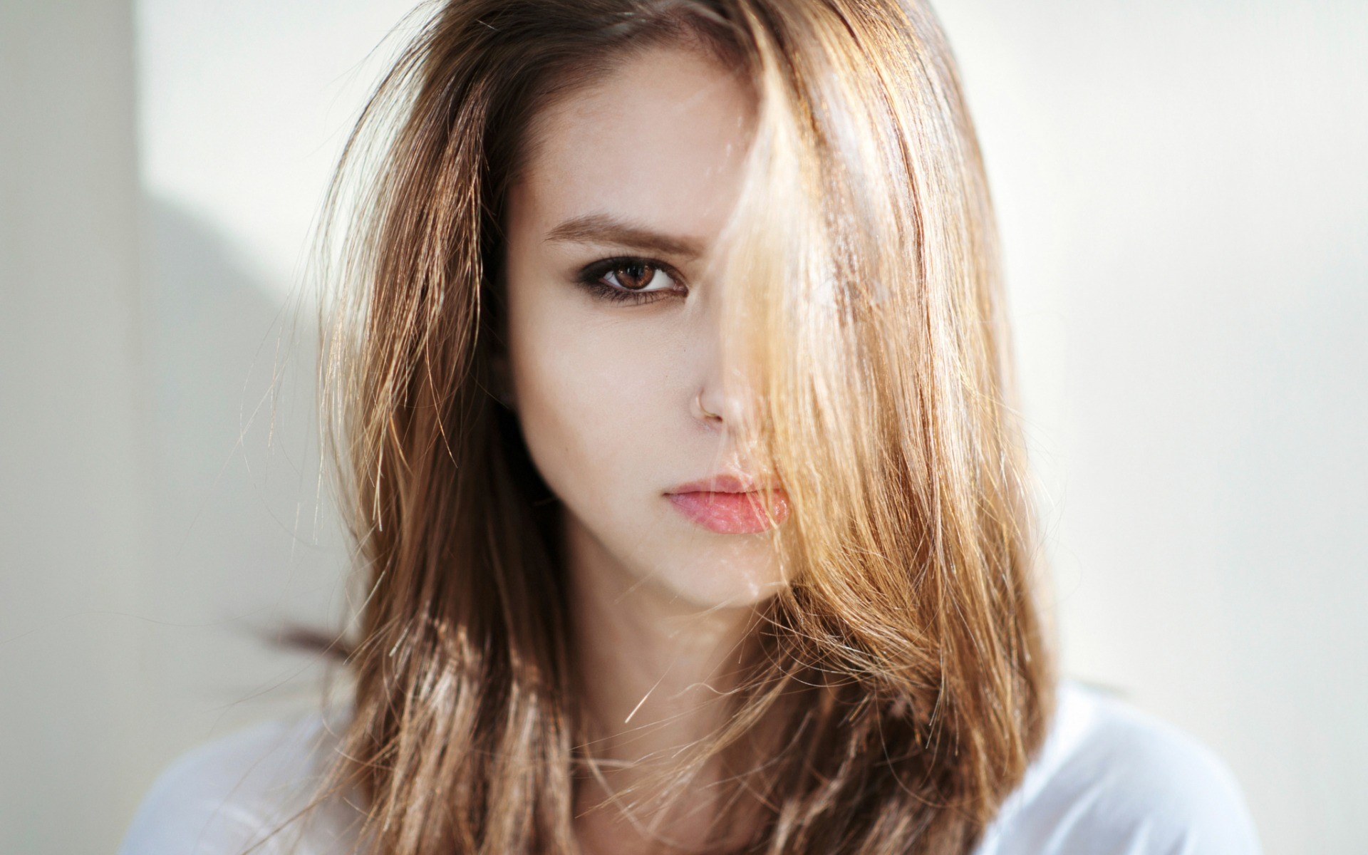 Woman with hair covering half her face HD Wallpaper