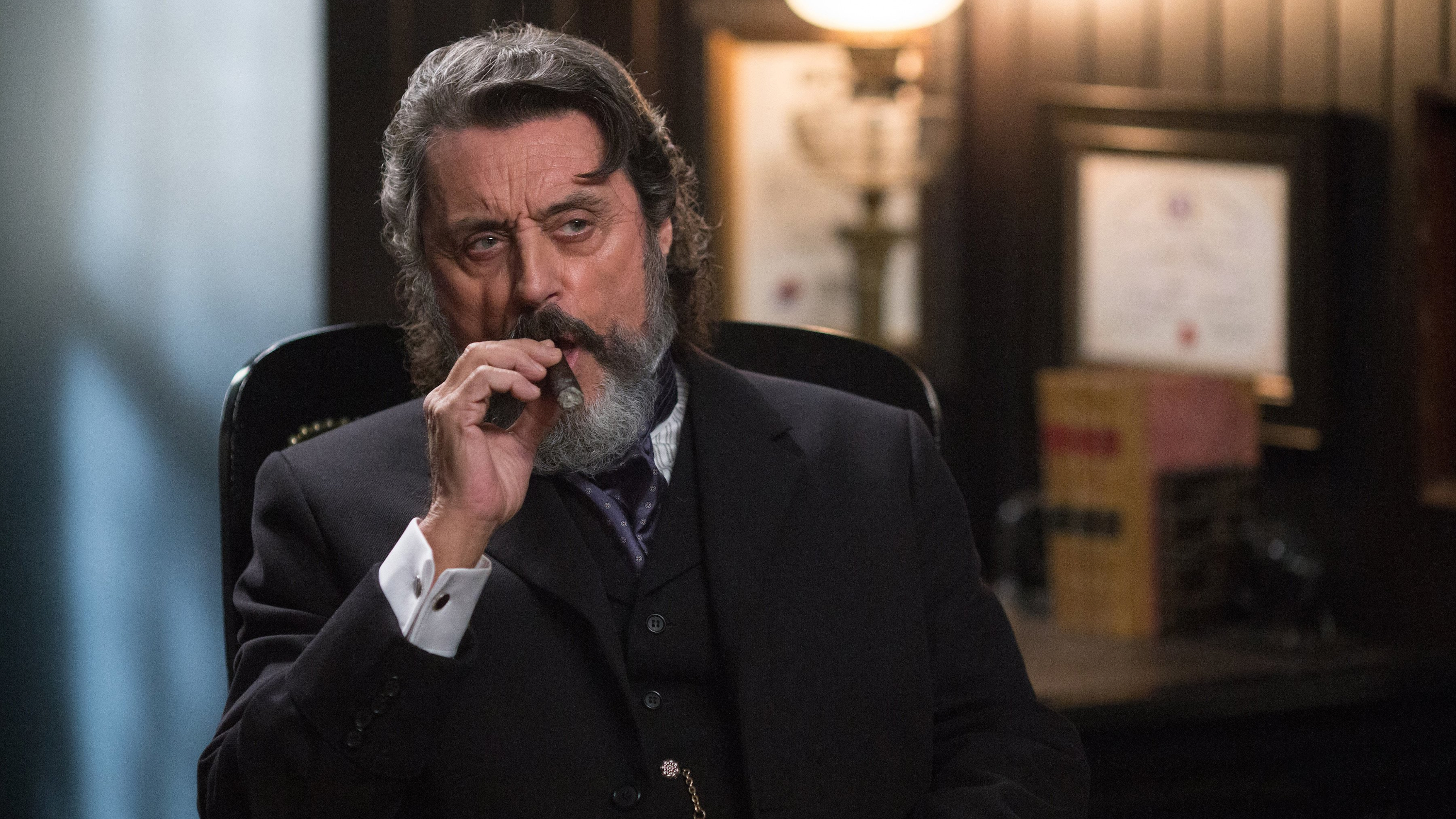 Ian McShane smoking a cigar HD Wallpaper