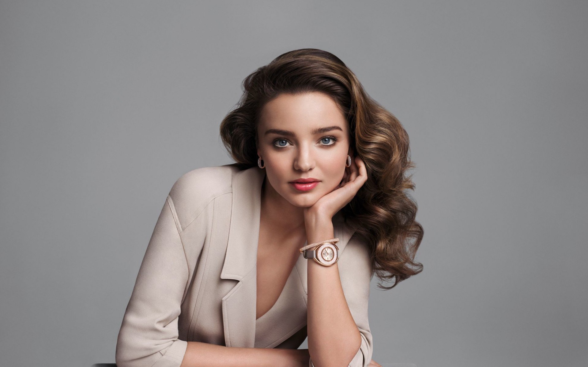 Miranda Kerr wearing a beige blazer and watch HD Wallpaper