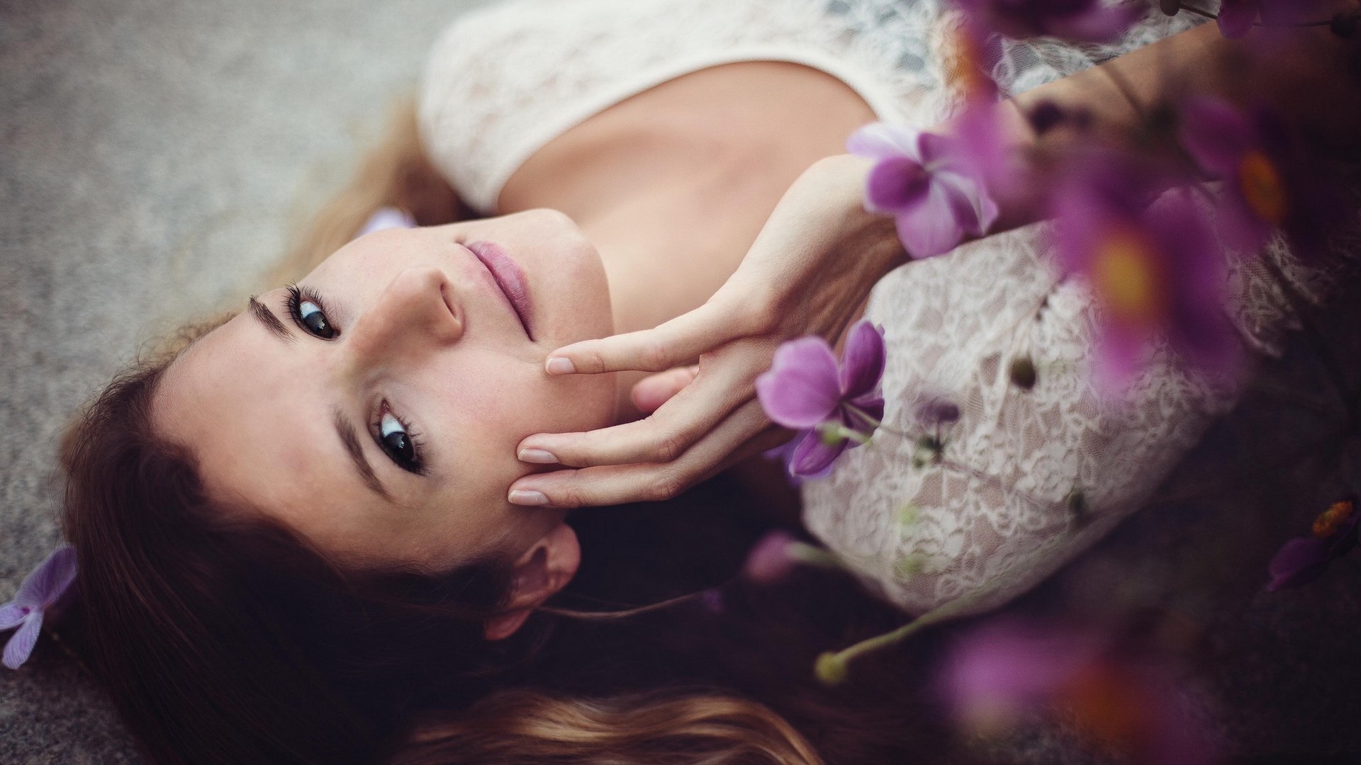 Woman lying down with purple flowers HD Wallpaper