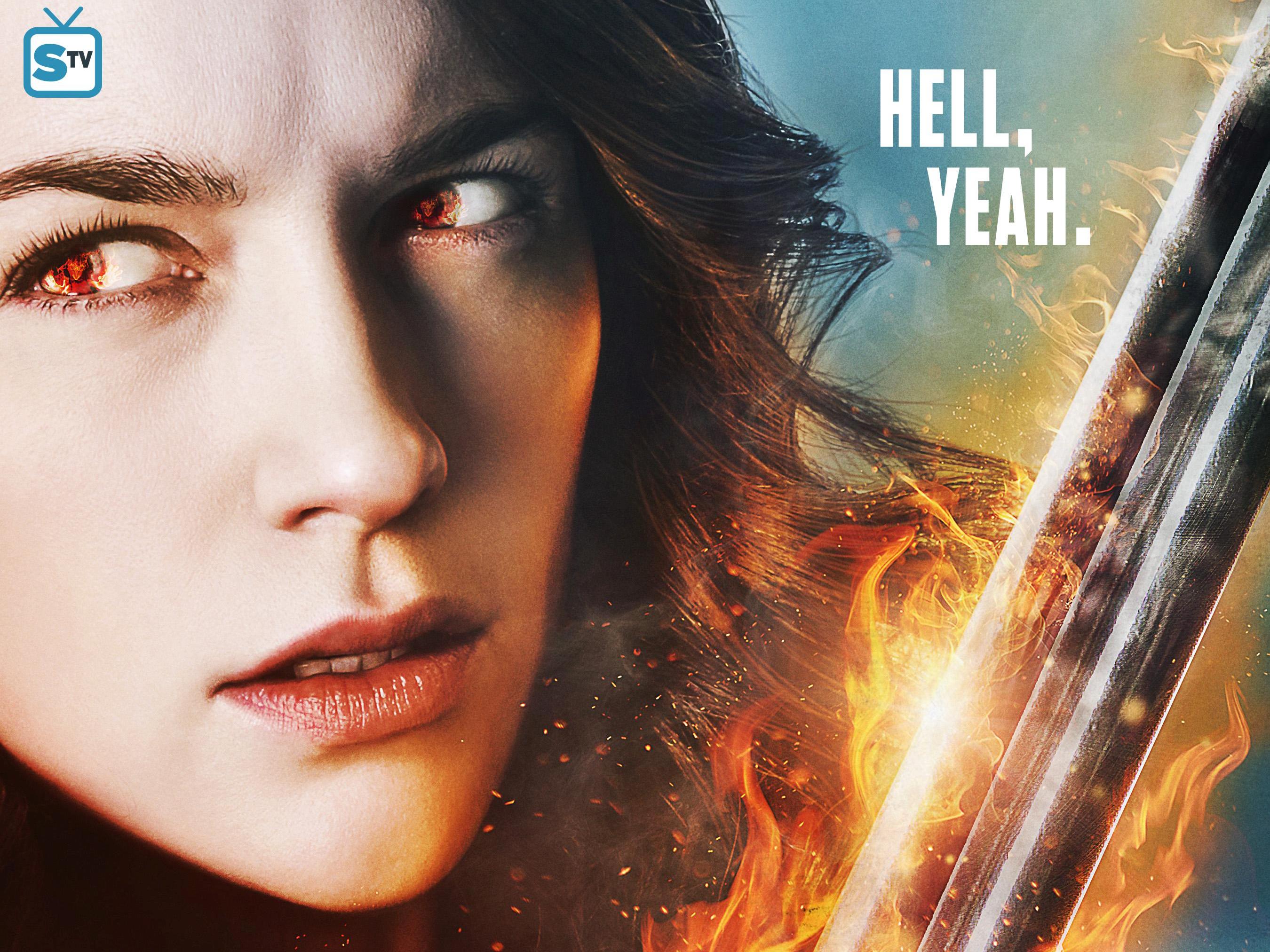 Wynonna Earp with fiery eyes and sword HD Wallpaper