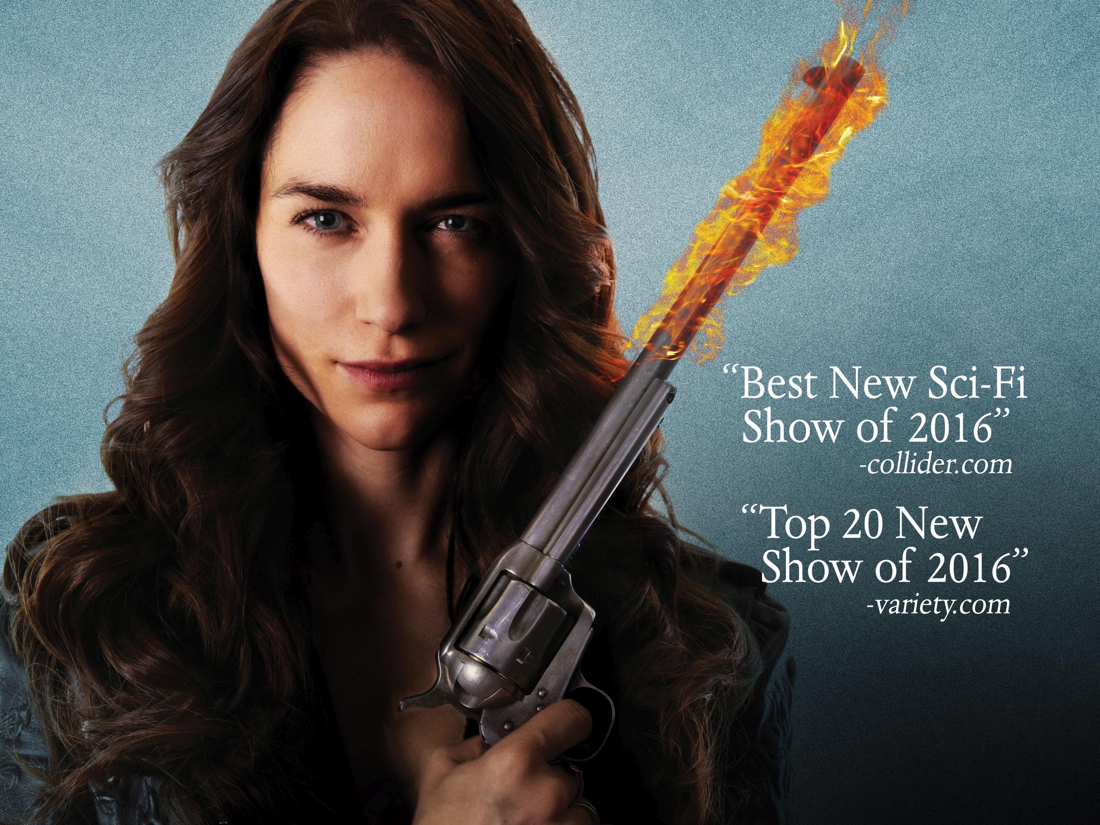 Melanie Scrofano holding a flaming gun HD Wallpaper