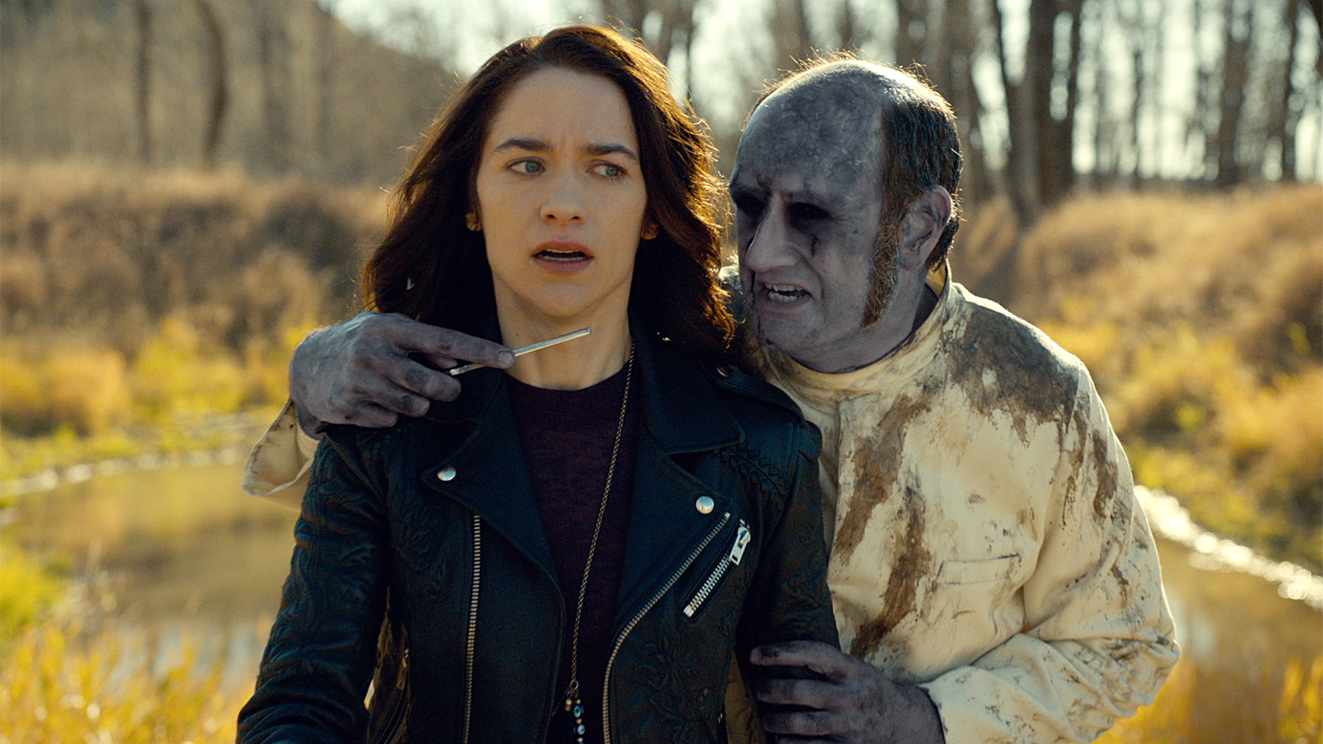 Melanie Scrofano held at knifepoint by a creature HD Wallpaper