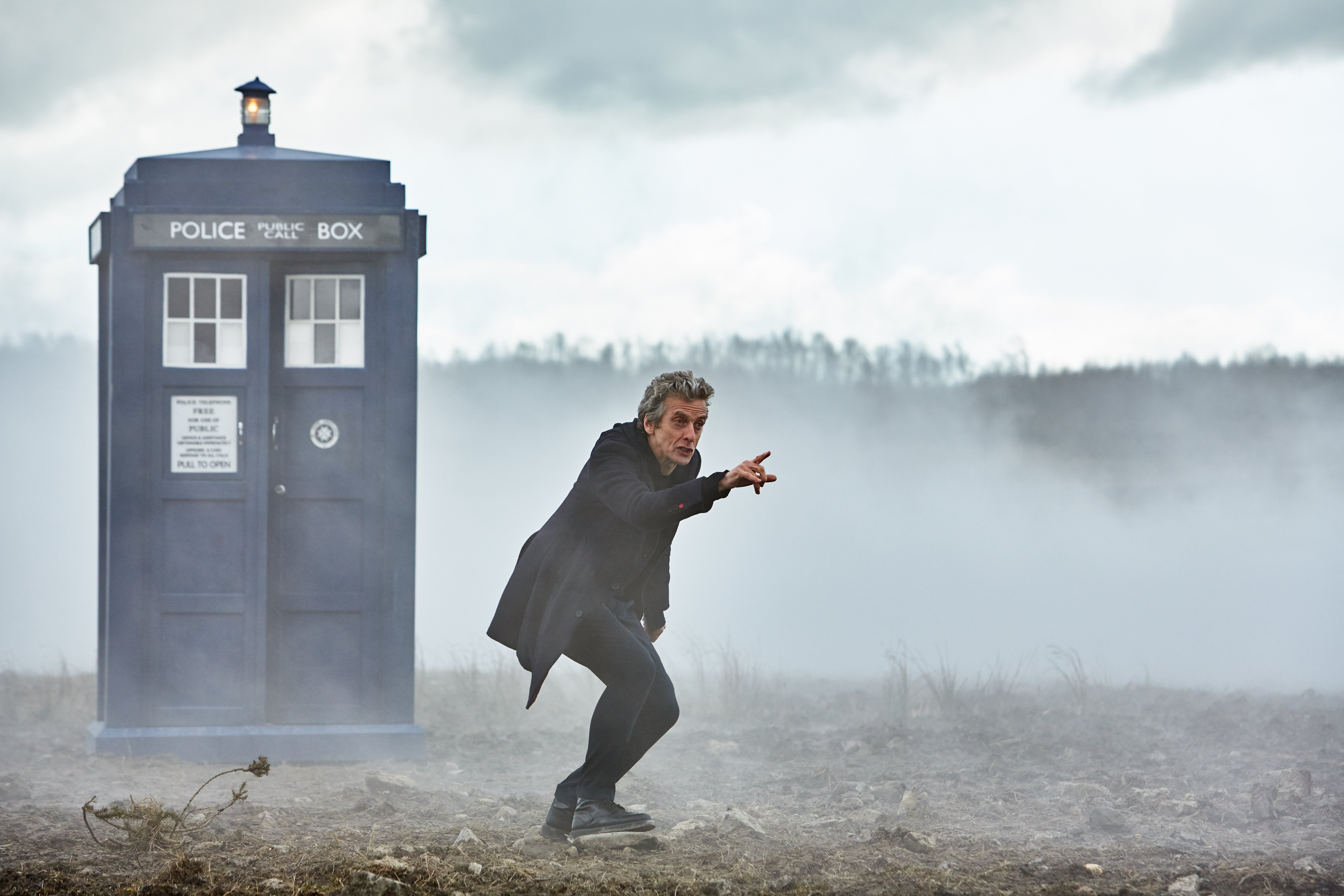 Peter Capaldi in a TARDIS Police Box HD Wallpaper