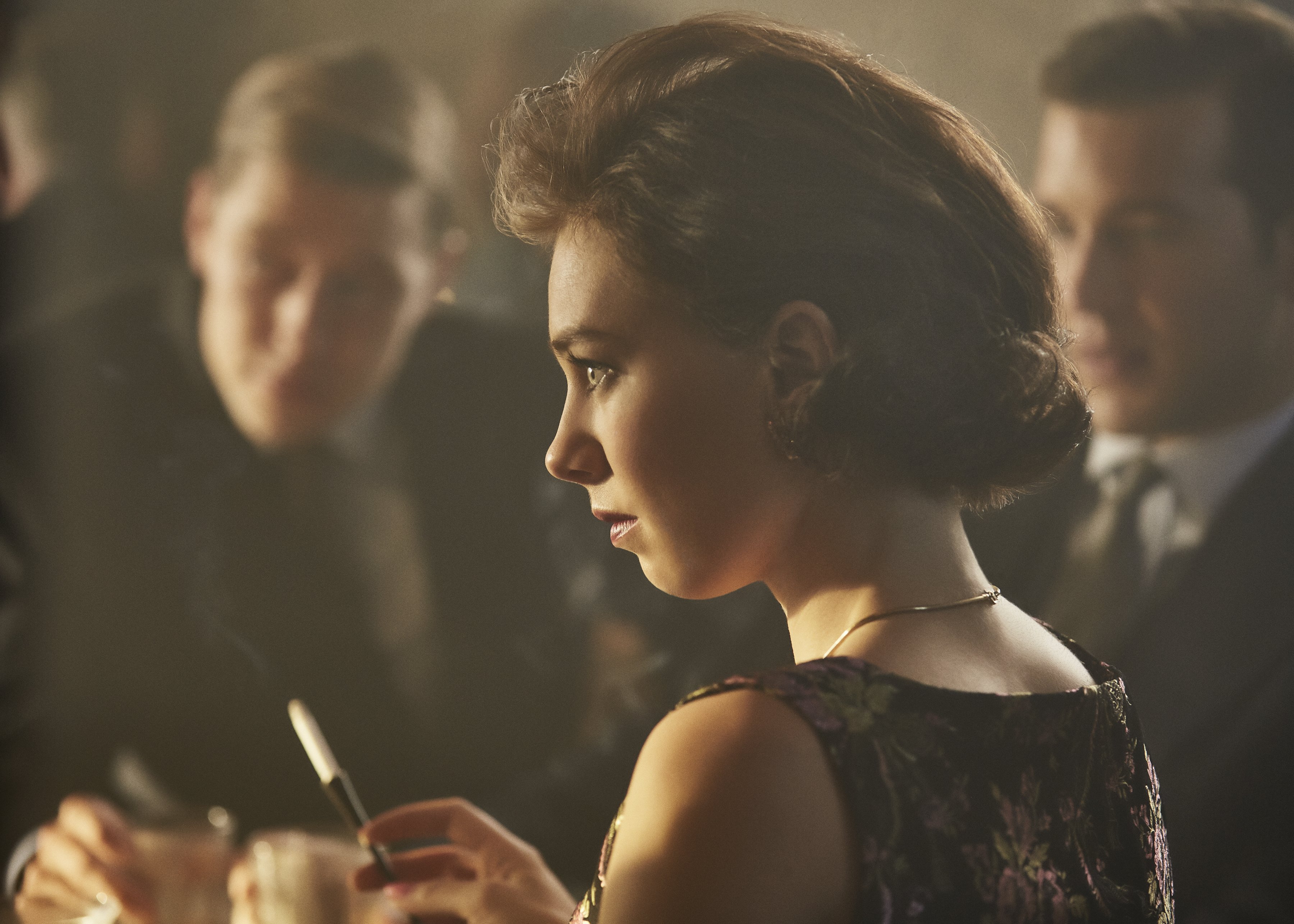 Vanessa Kirby in a dark dress holding a cigarette holder HD Wallpaper