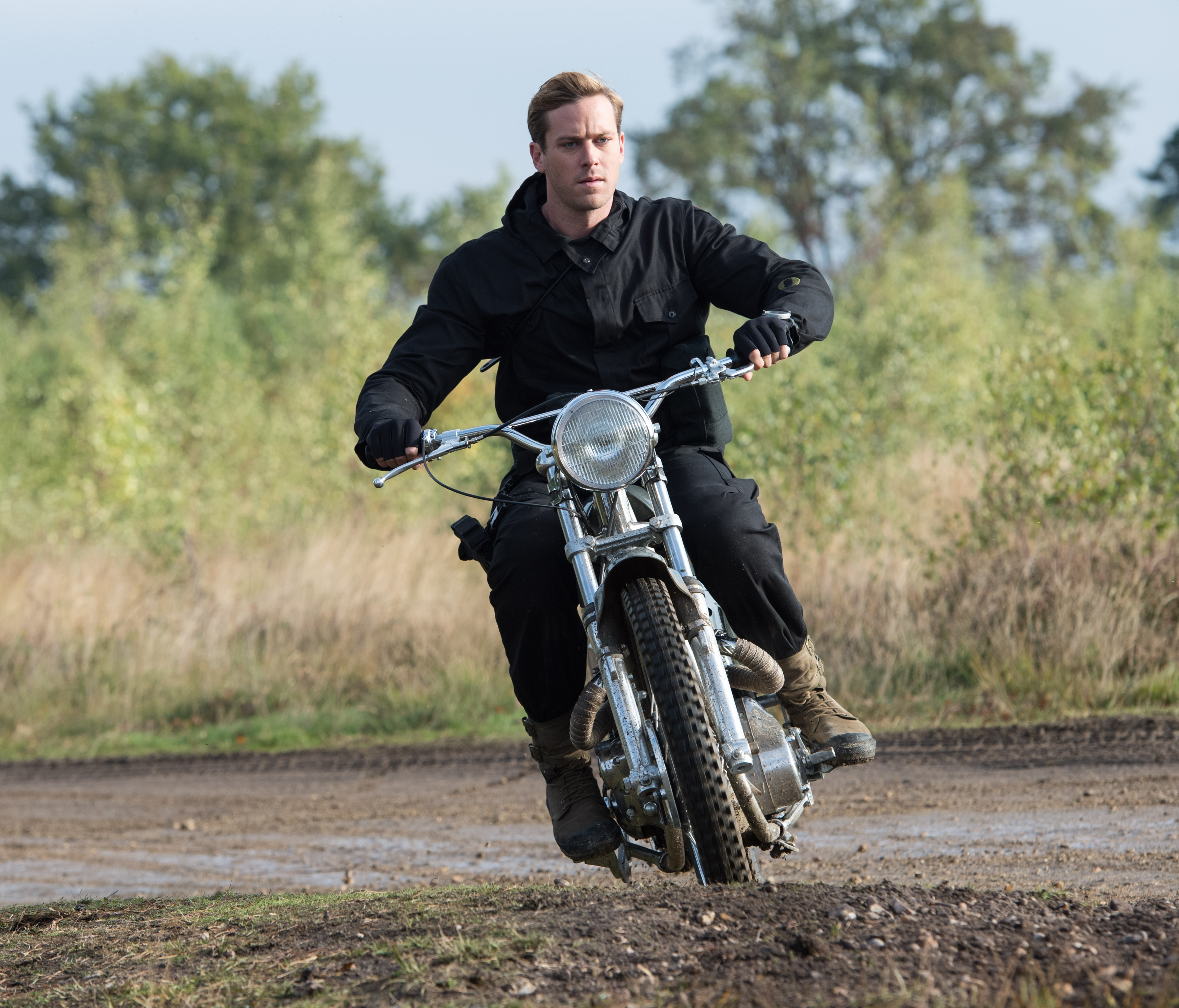 Armie Hammer riding a motorcycle HD Wallpaper