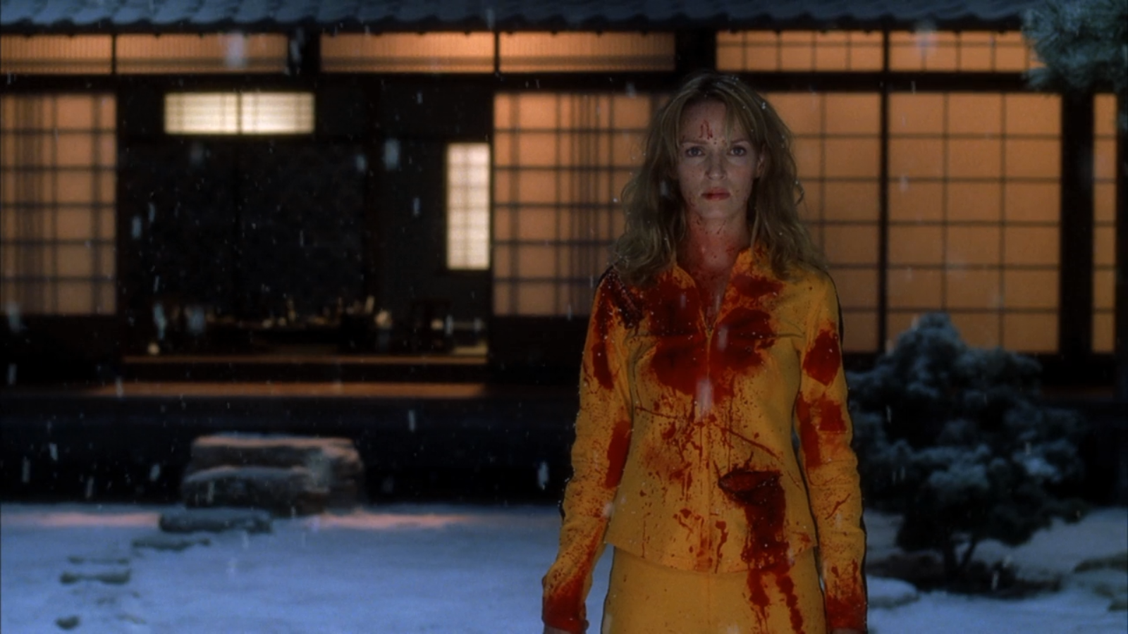 Uma Thurman covered in blood in the snow HD Wallpaper