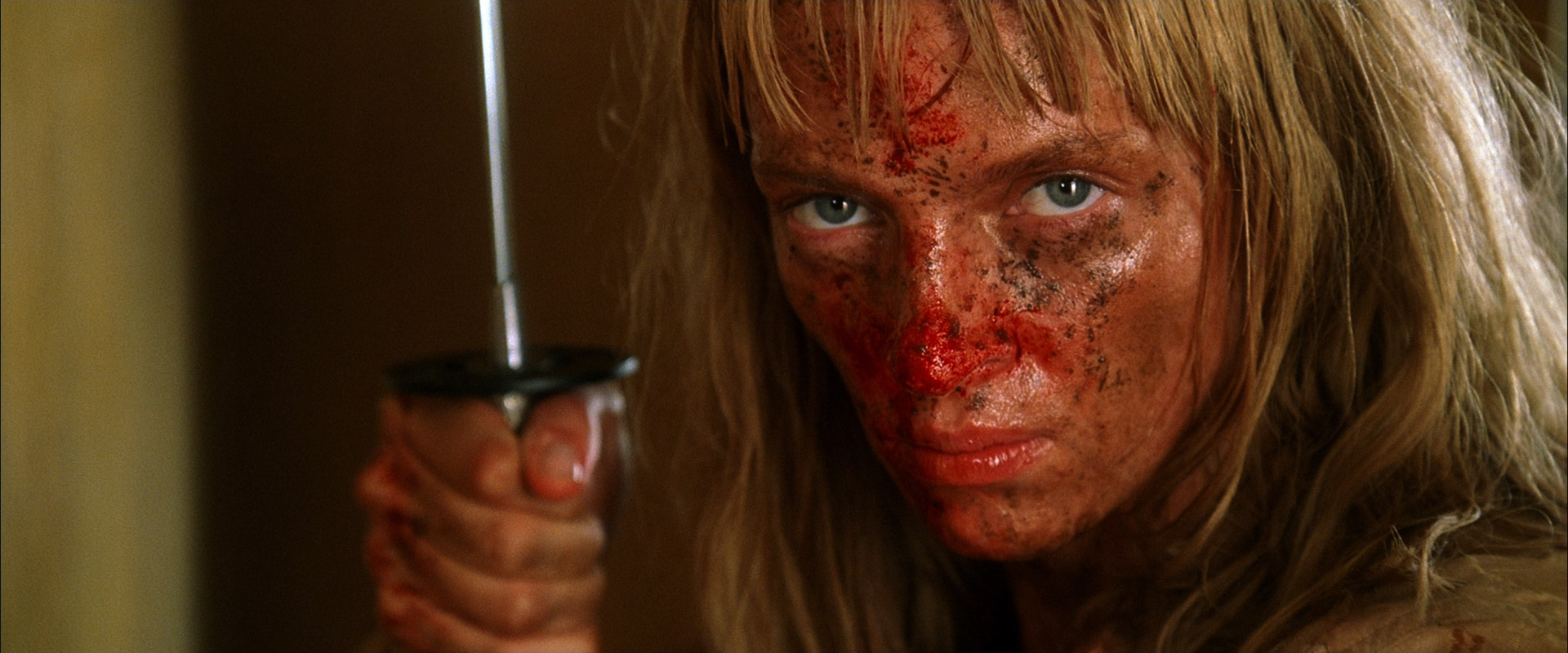 Uma Thurman holding a sword HD Wallpaper