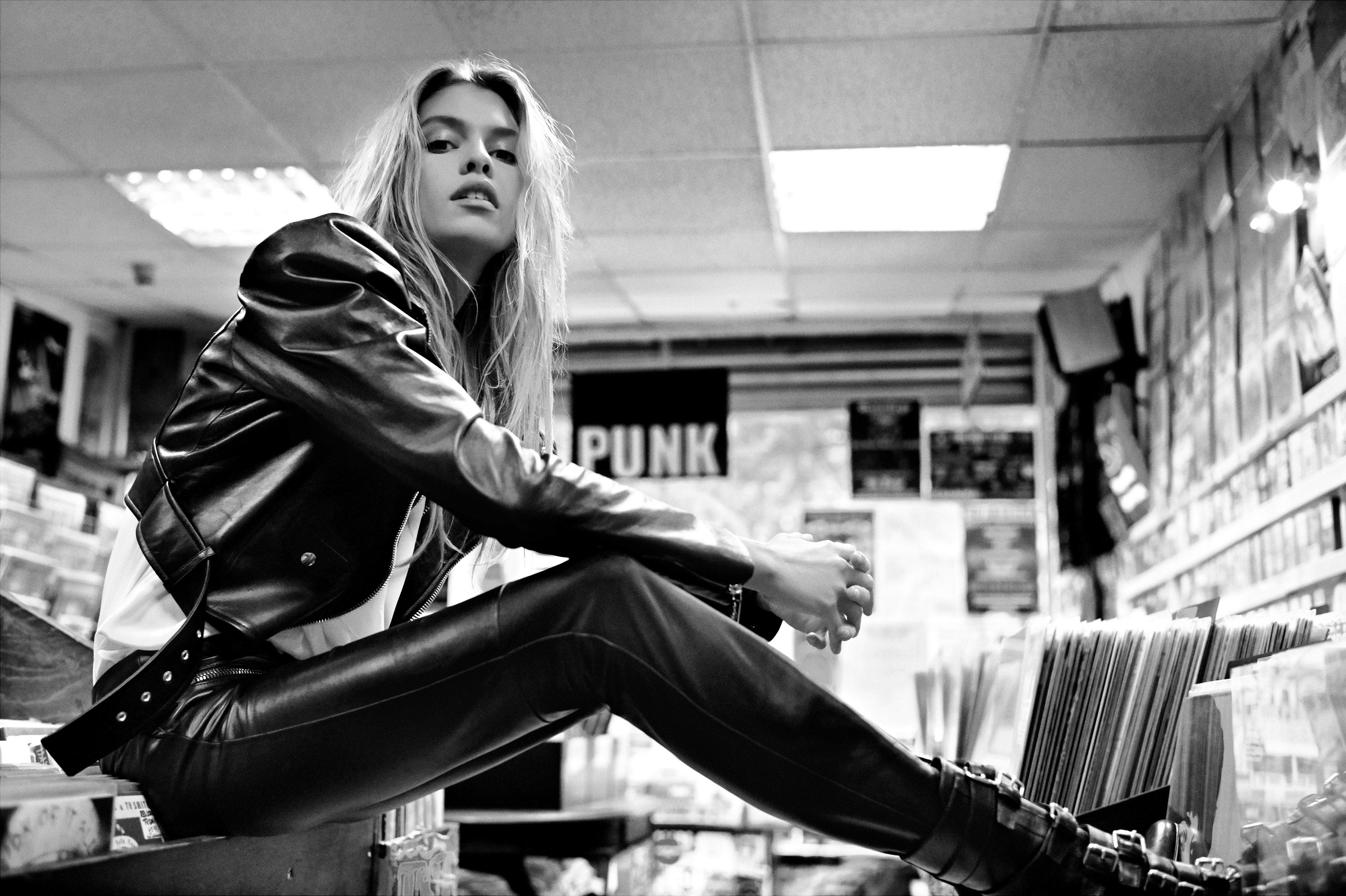 Stella Maxwell in a record store HD Wallpaper
