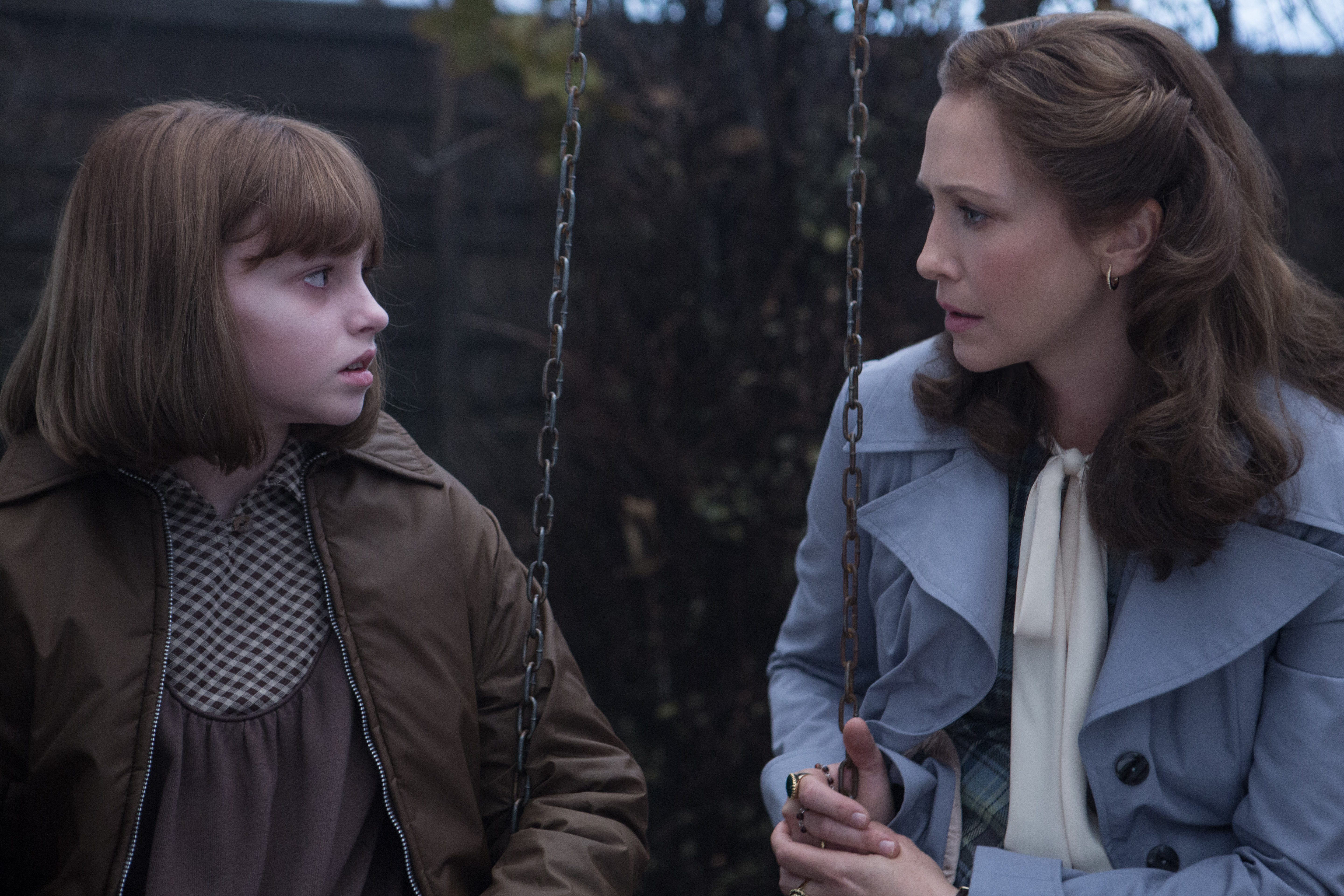 Vera Farmiga and a young girl on a swing set HD Wallpaper