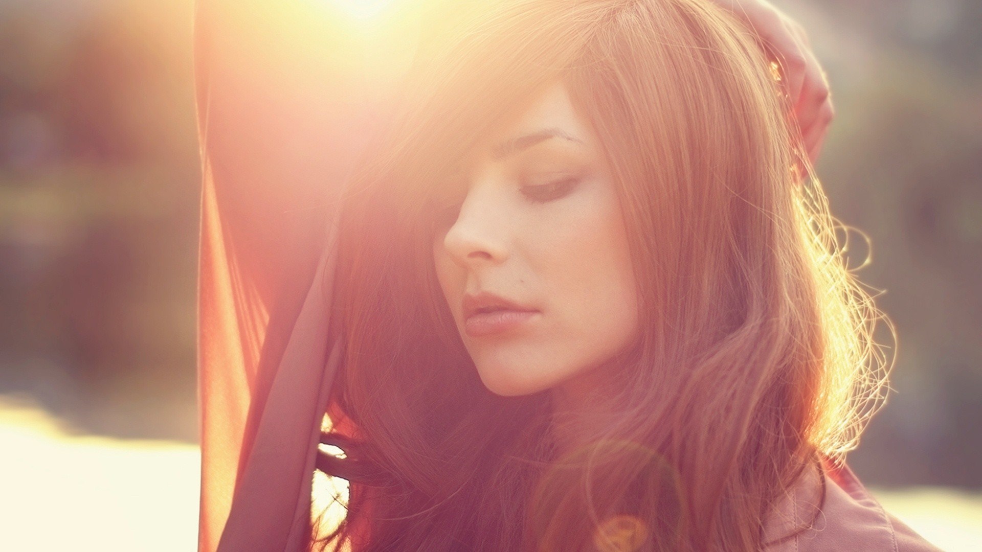 Woman with long hair in sunlight HD Wallpaper