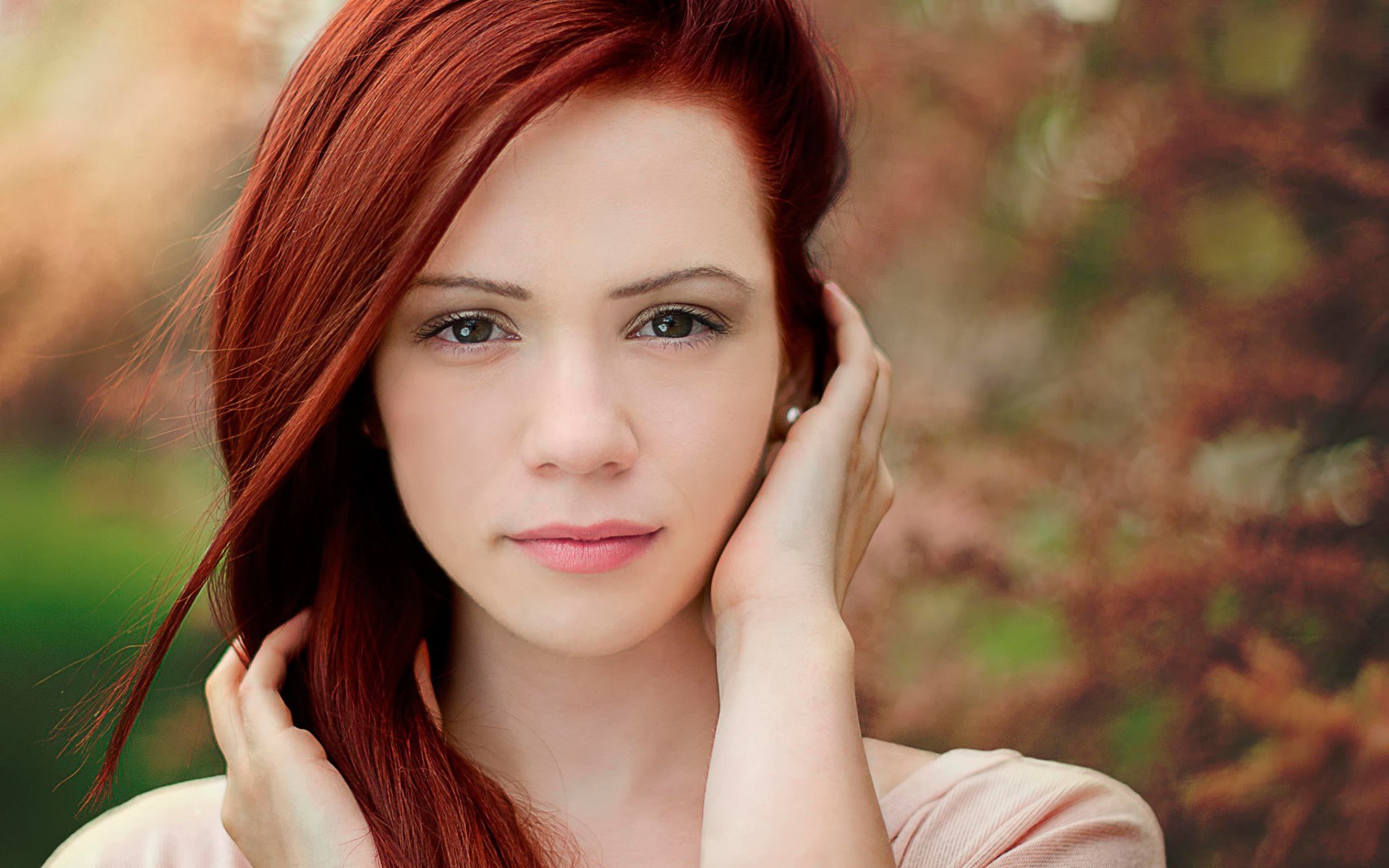 Woman with red hair touching her face HD Wallpaper
