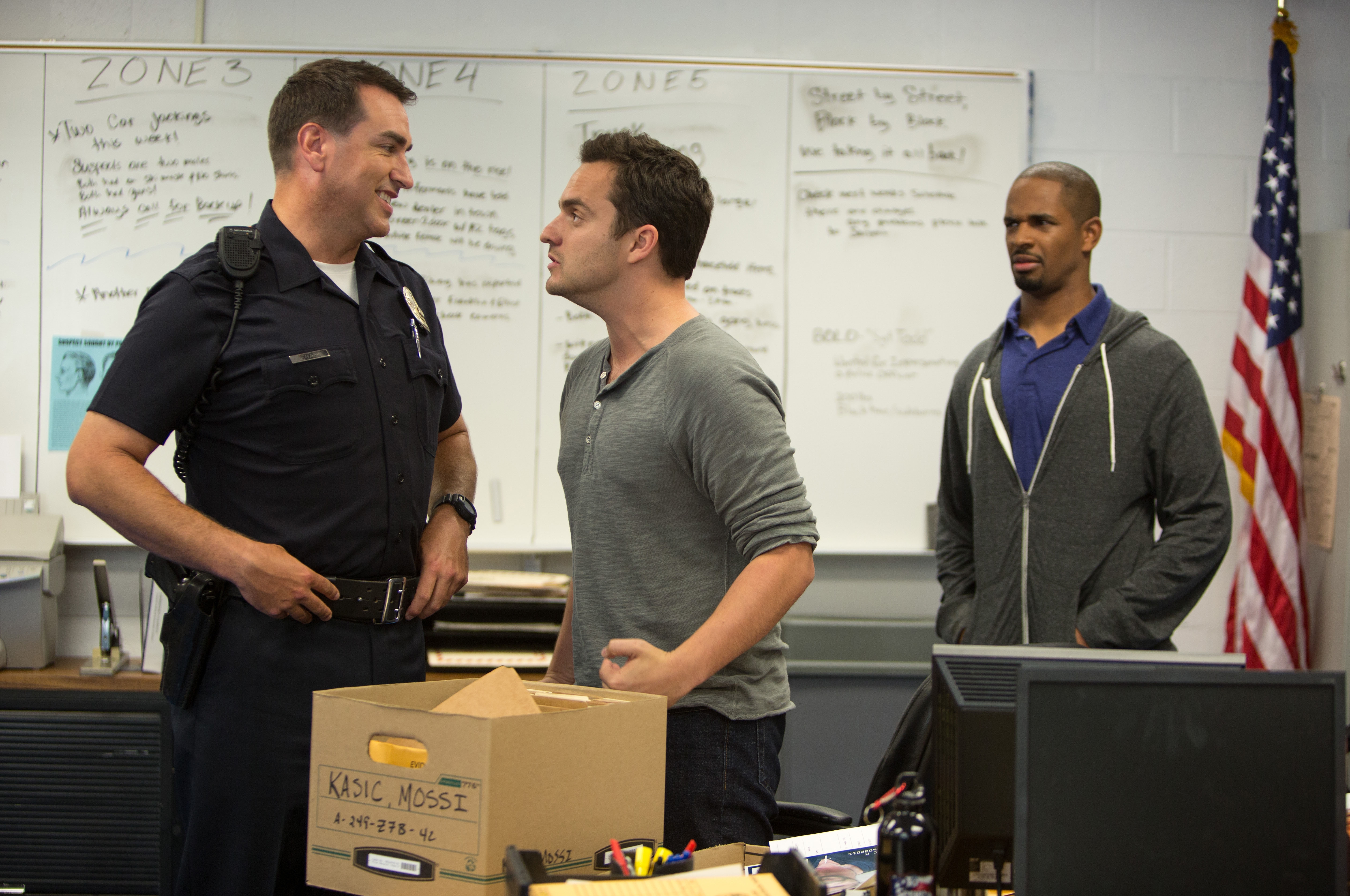 Police officers and a civilian in a precinct HD Wallpaper