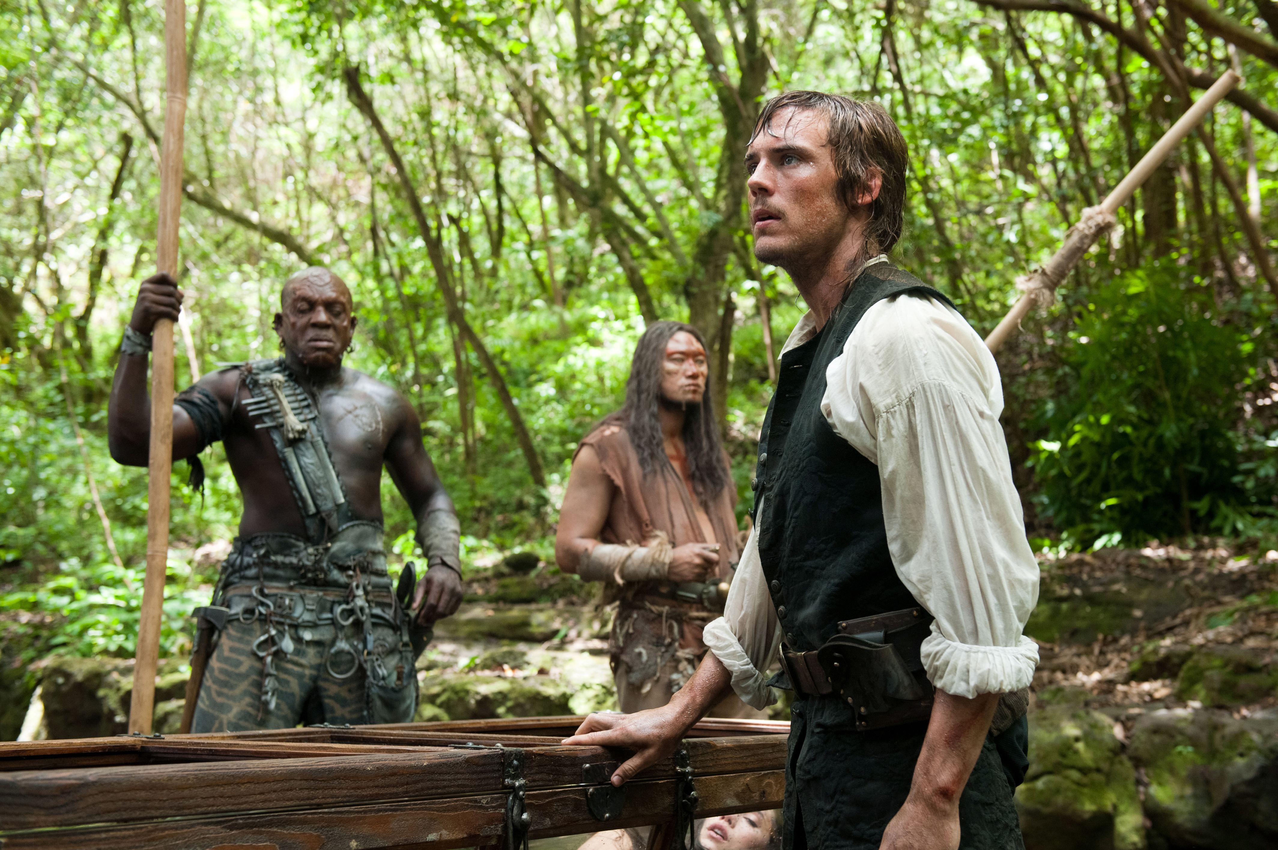 Sam Claflin and companions in a jungle HD Wallpaper