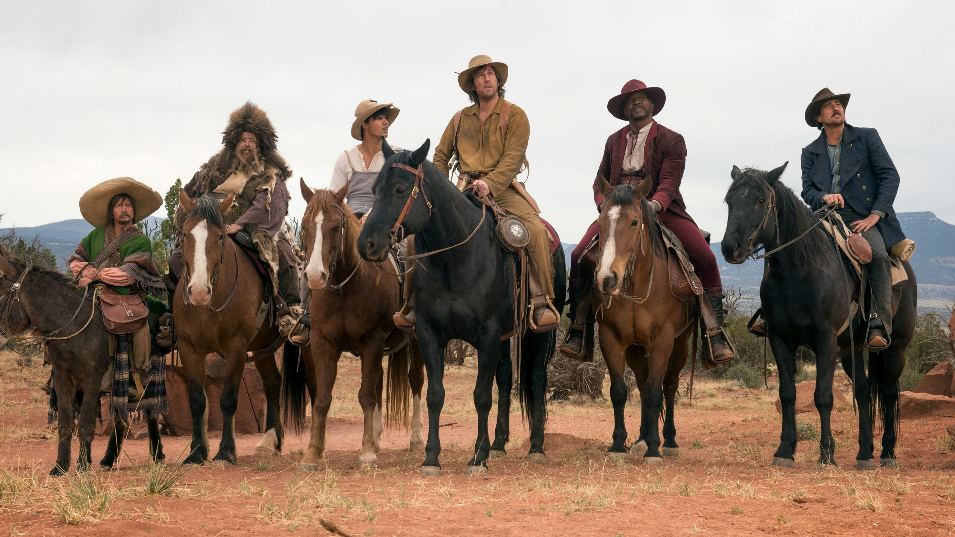 Six men on horseback in a desert landscape HD Wallpaper