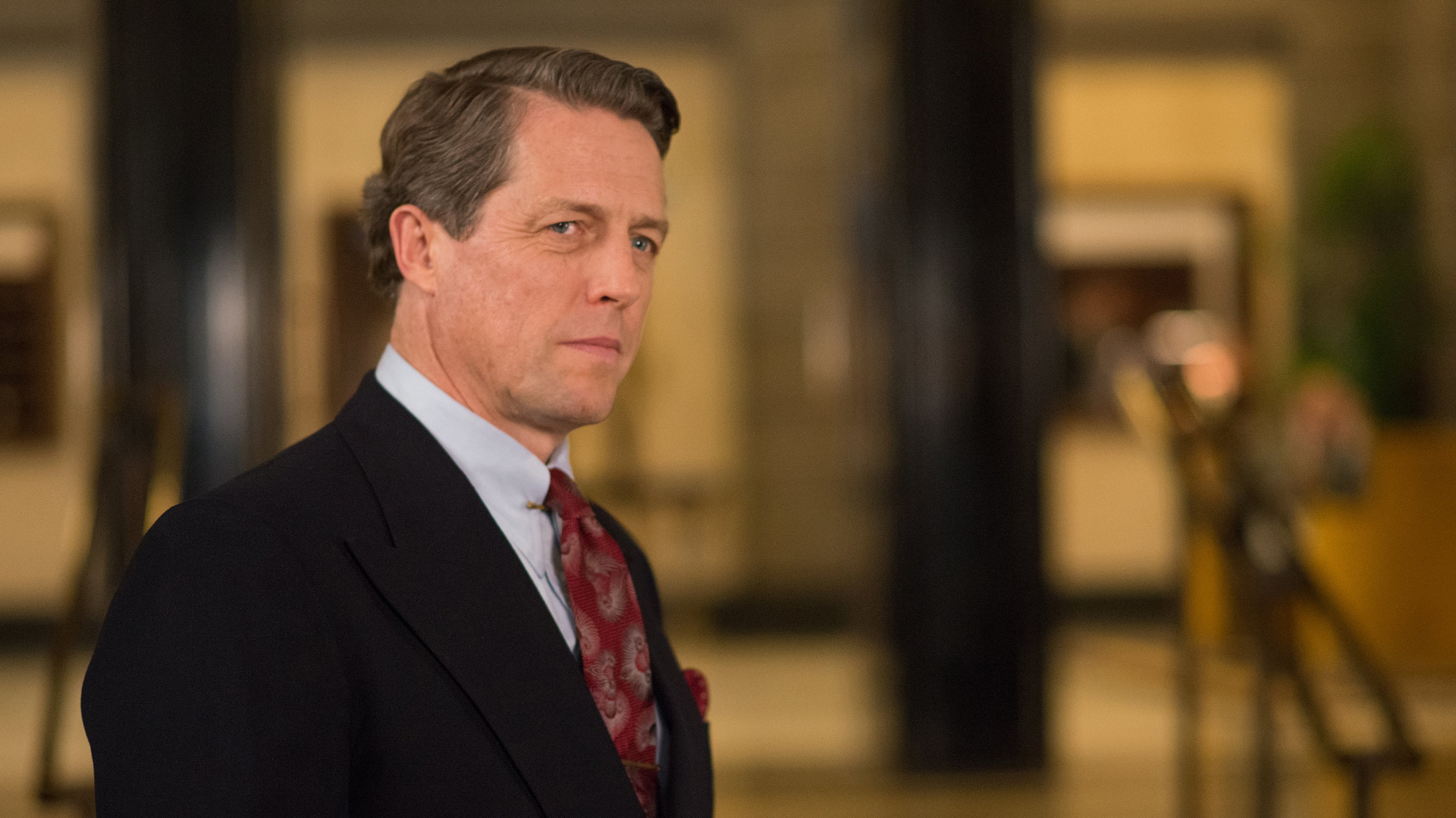 Hugh Grant in a suit HD Wallpaper