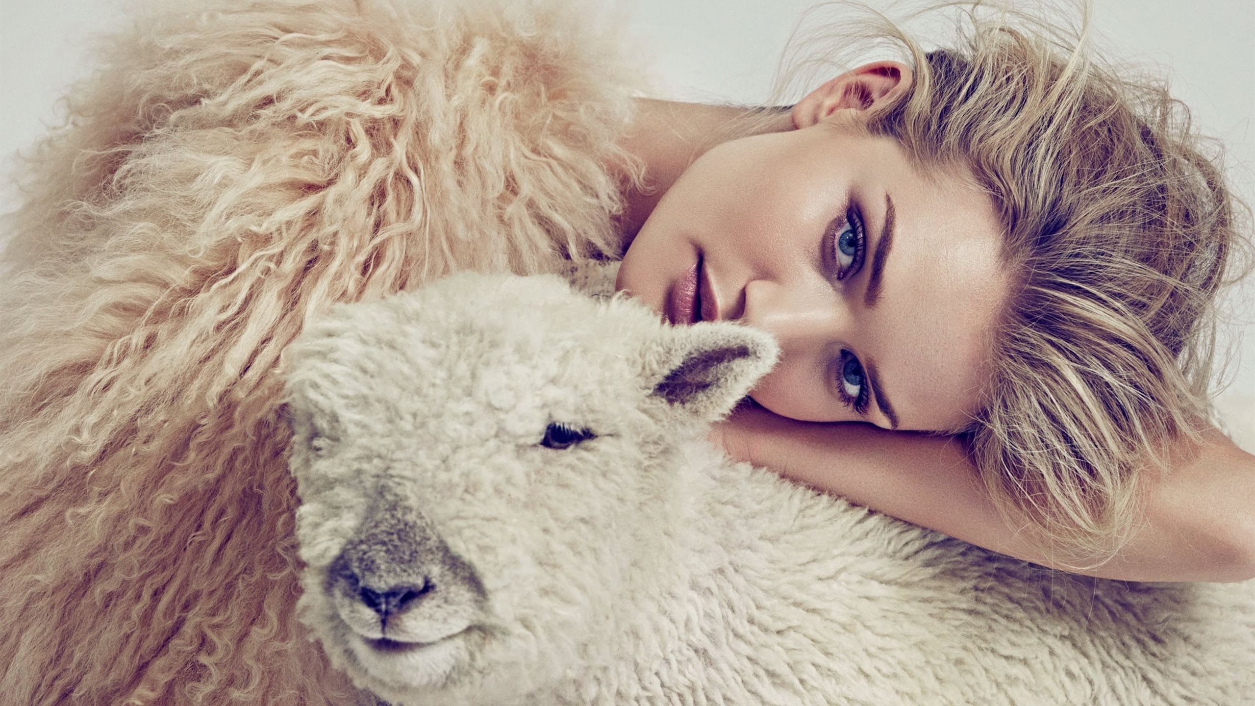 Woman and lamb with fluffy textures HD Wallpaper