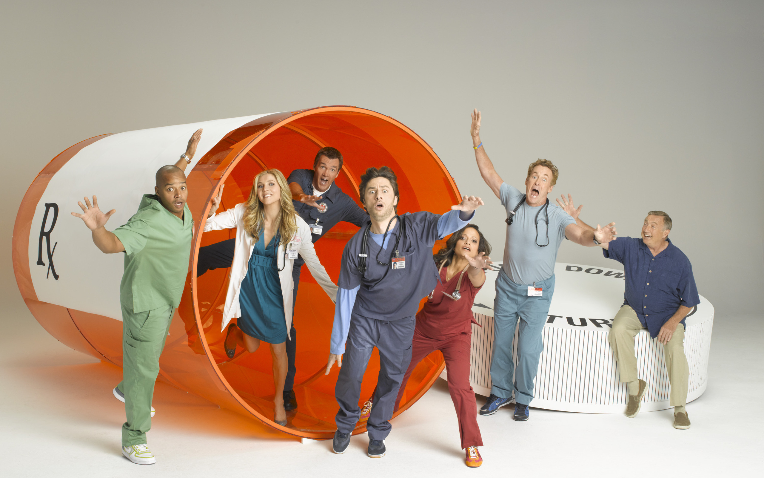 Scrubs cast with a giant pill bottle HD Wallpaper