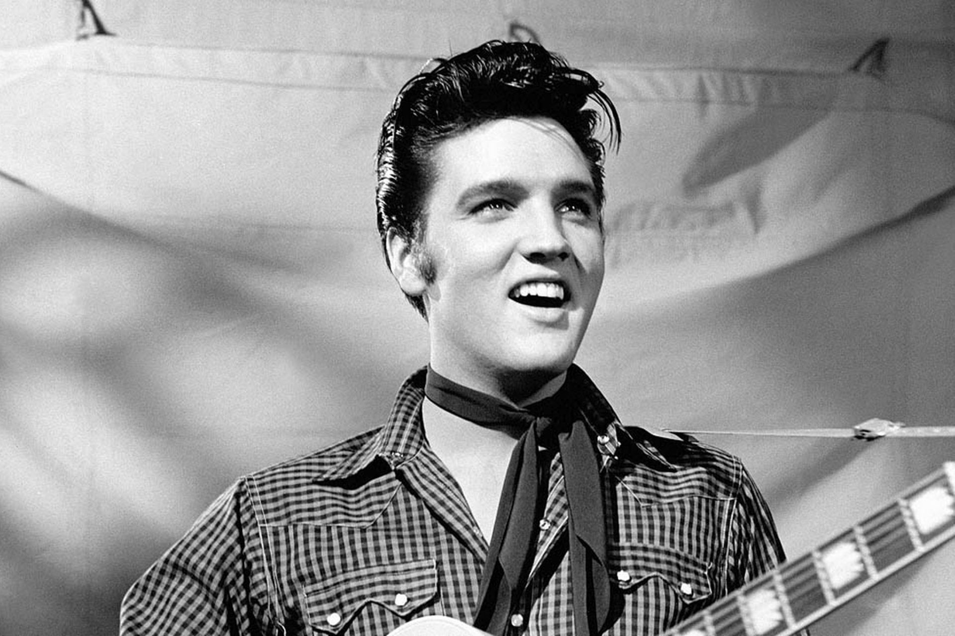 Elvis Presley playing guitar HD Wallpaper
