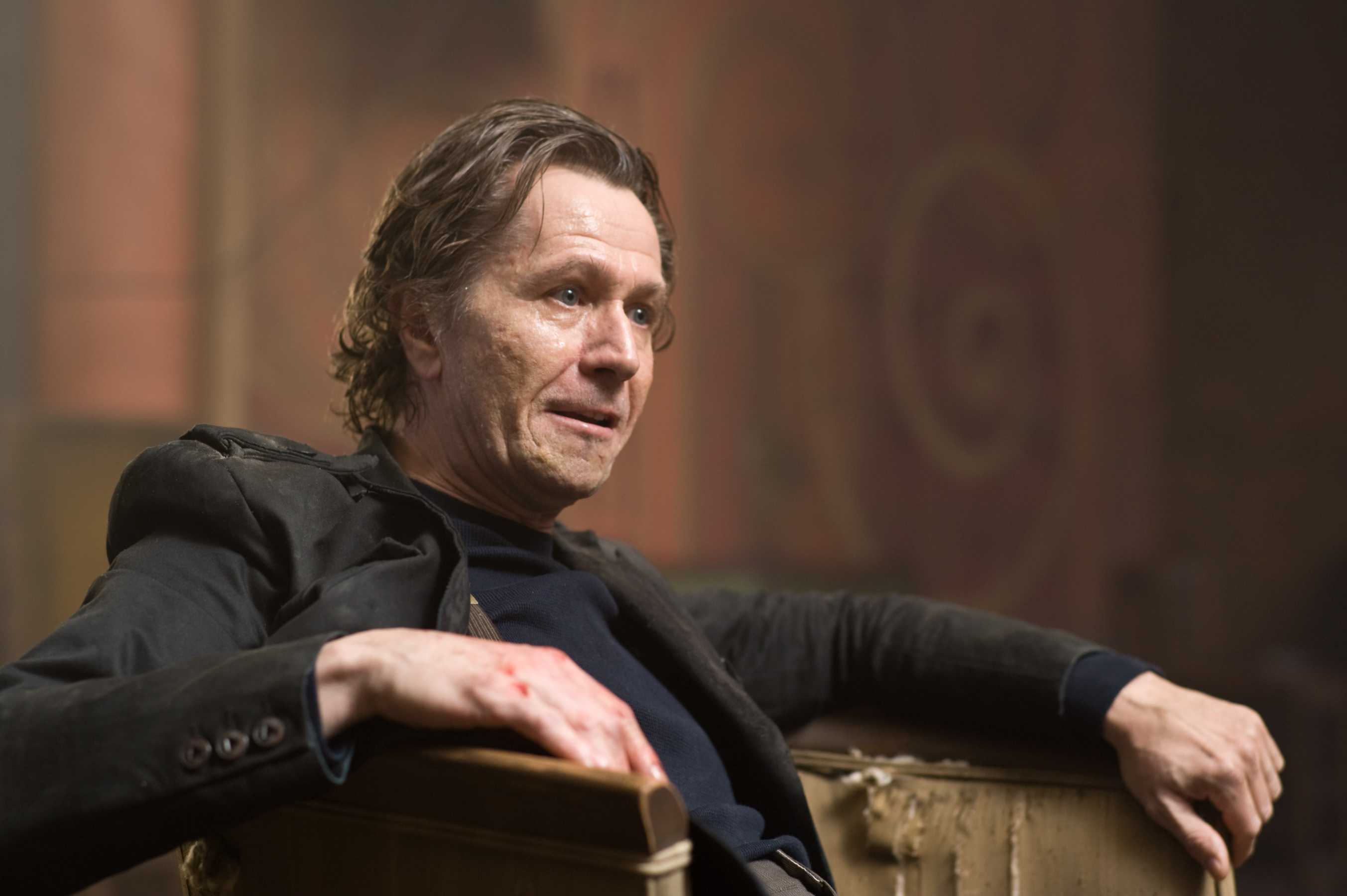 Gary Oldman in a dark room HD Wallpaper