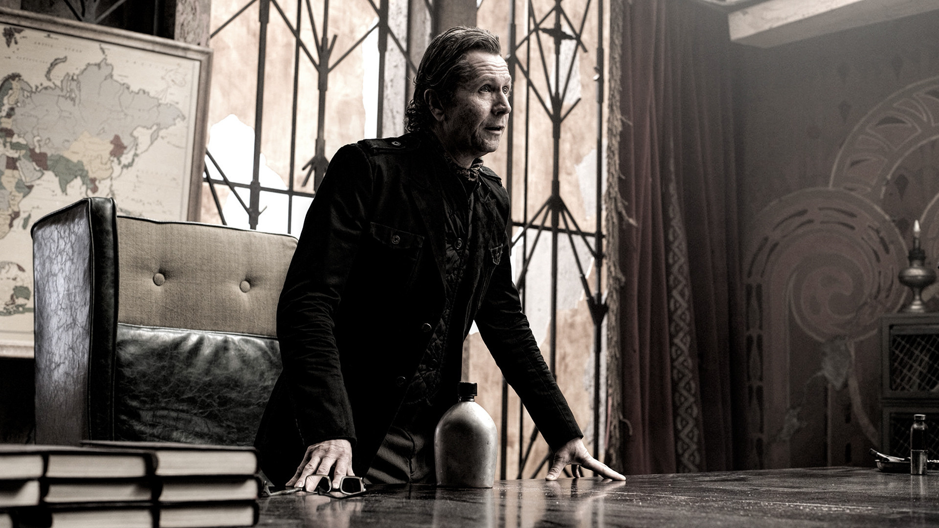 Gary Oldman in a dimly lit room HD Wallpaper