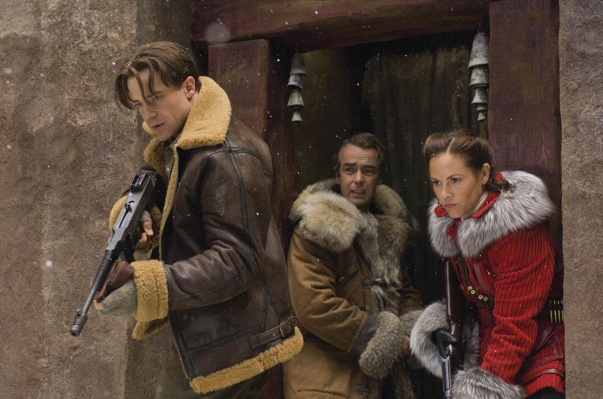 Brendan Fraser, Maria Bello, and John Hannah in The Mummy: Tomb of the Dragon Emperor HD Wallpaper