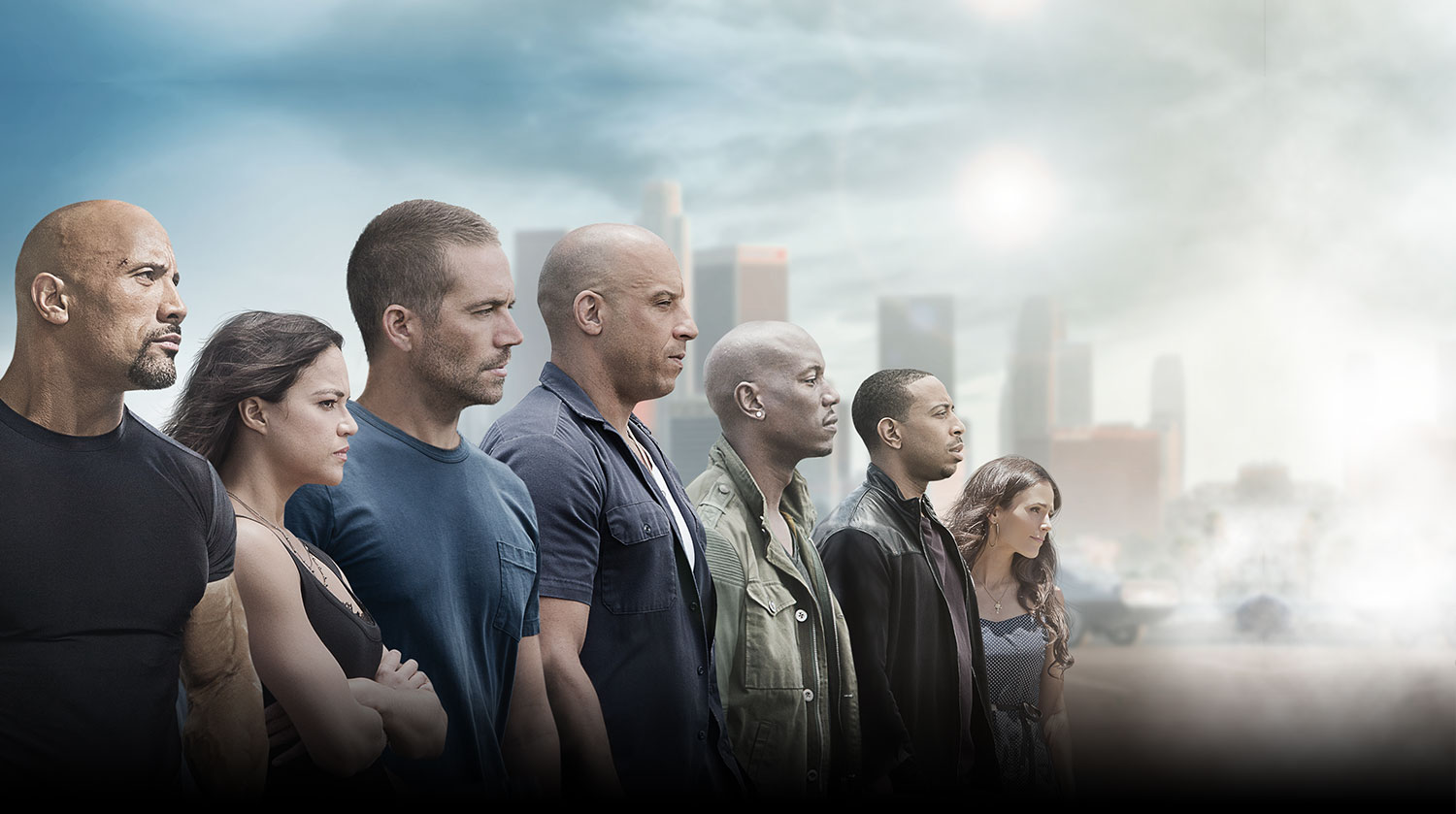 Fast & Furious cast standing in front of city skyline HD Wallpaper