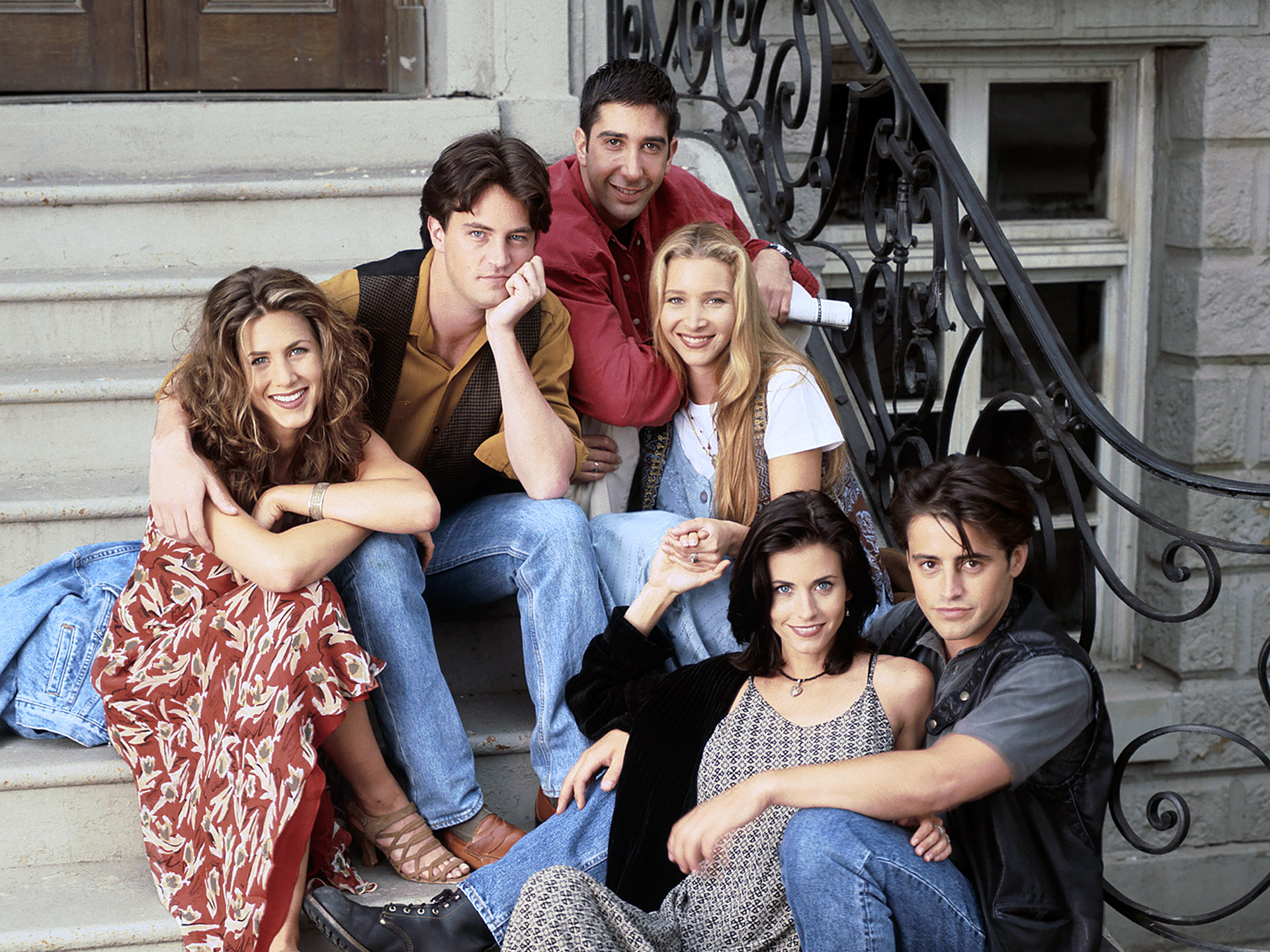The cast of Friends sitting on stairs HD Wallpaper