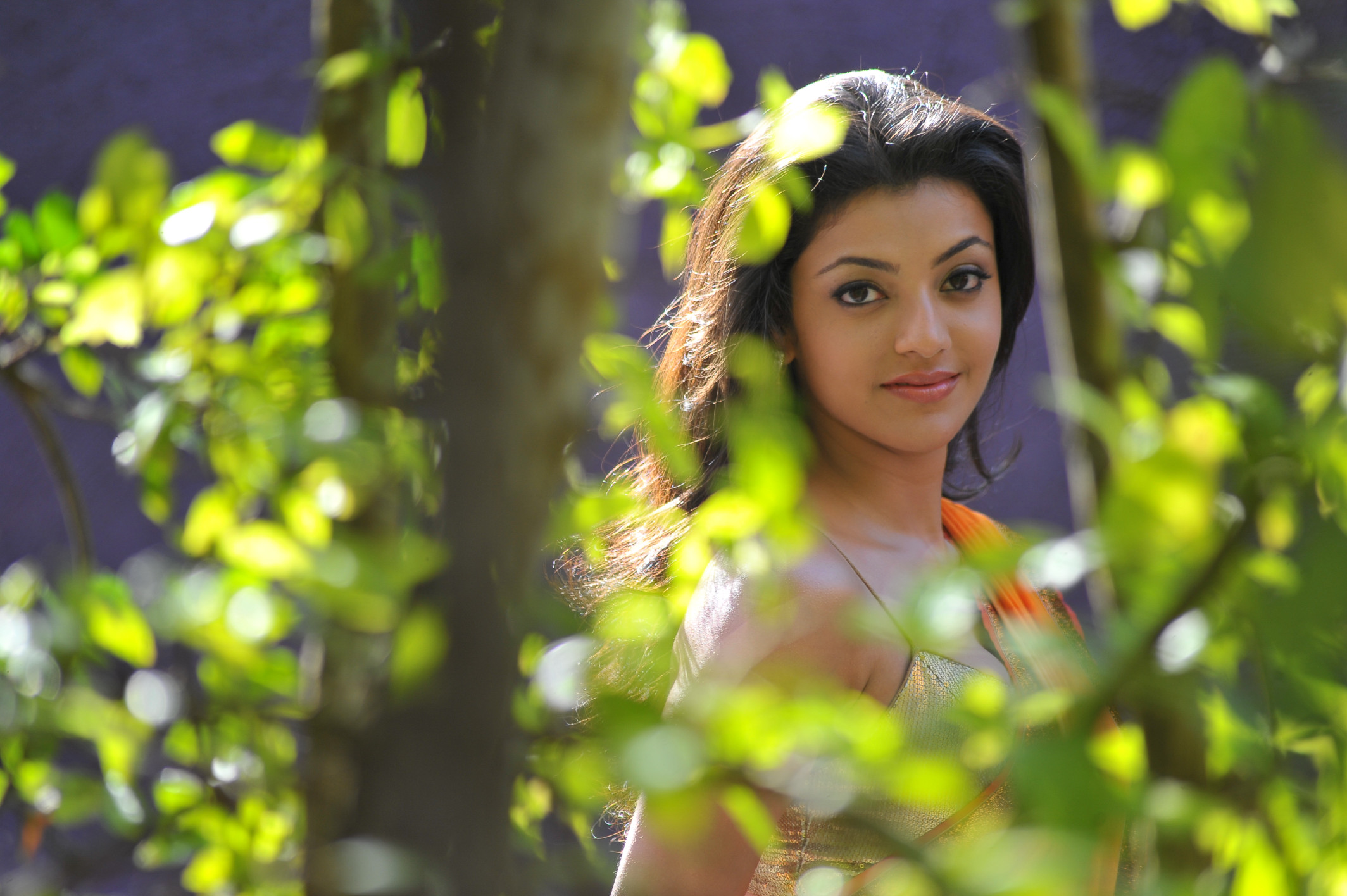 Kajal Agarwal in a golden outfit HD Wallpaper