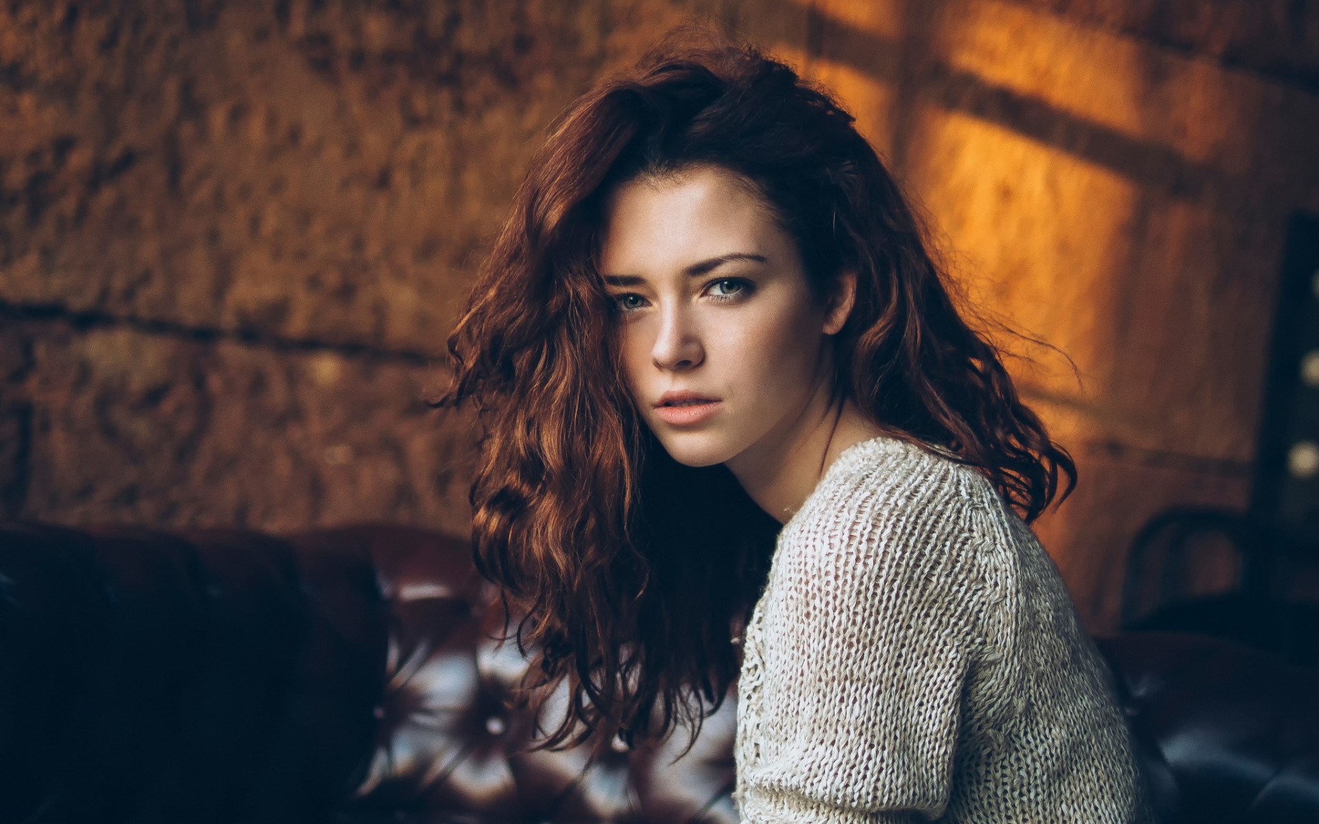 Woman with curly hair wearing a sweater HD Wallpaper
