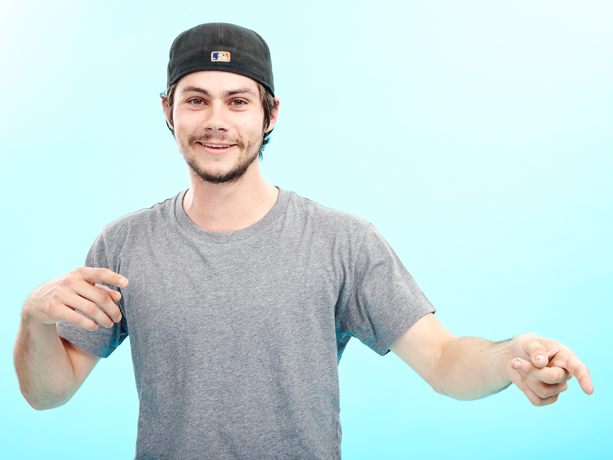 Dylan O'Brien pointing HD Wallpaper