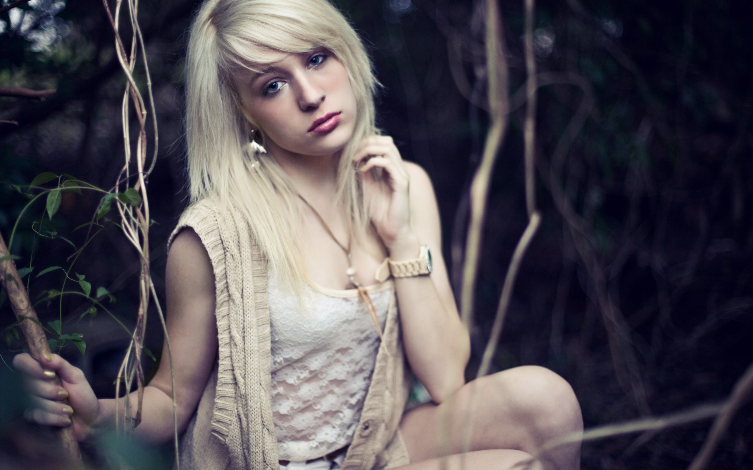 Woman with blonde hair in a forest HD Wallpaper