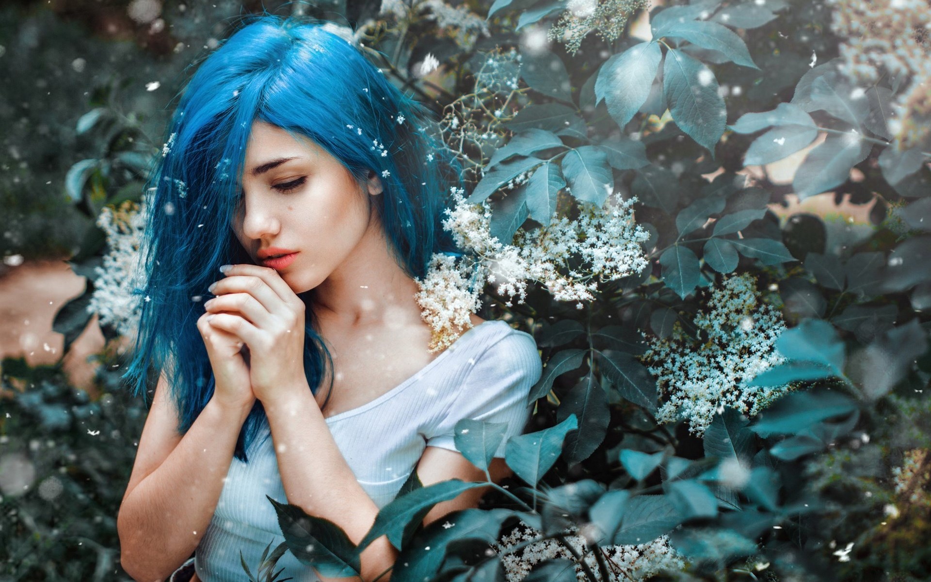 Woman with blue hair in a garden HD Wallpaper