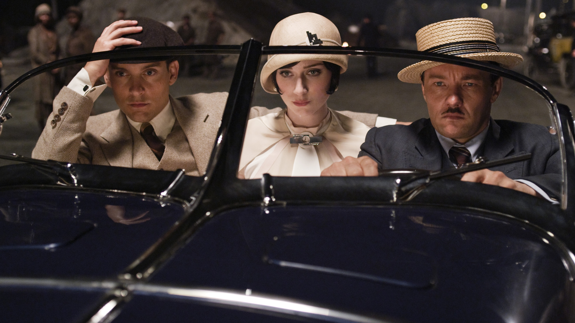 Tobey Maguire in a vintage car HD Wallpaper