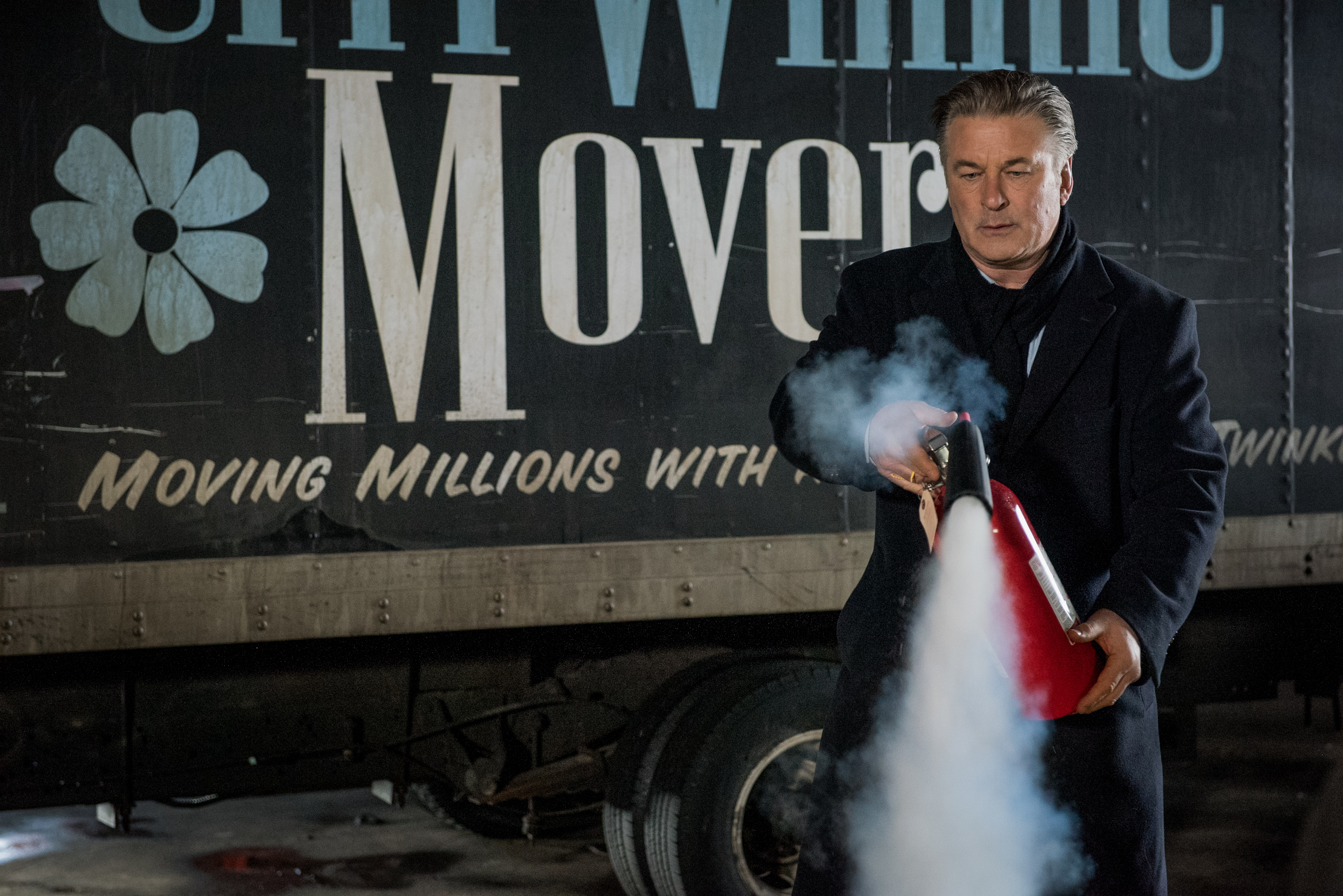 Alec Baldwin with a fire extinguisher HD Wallpaper