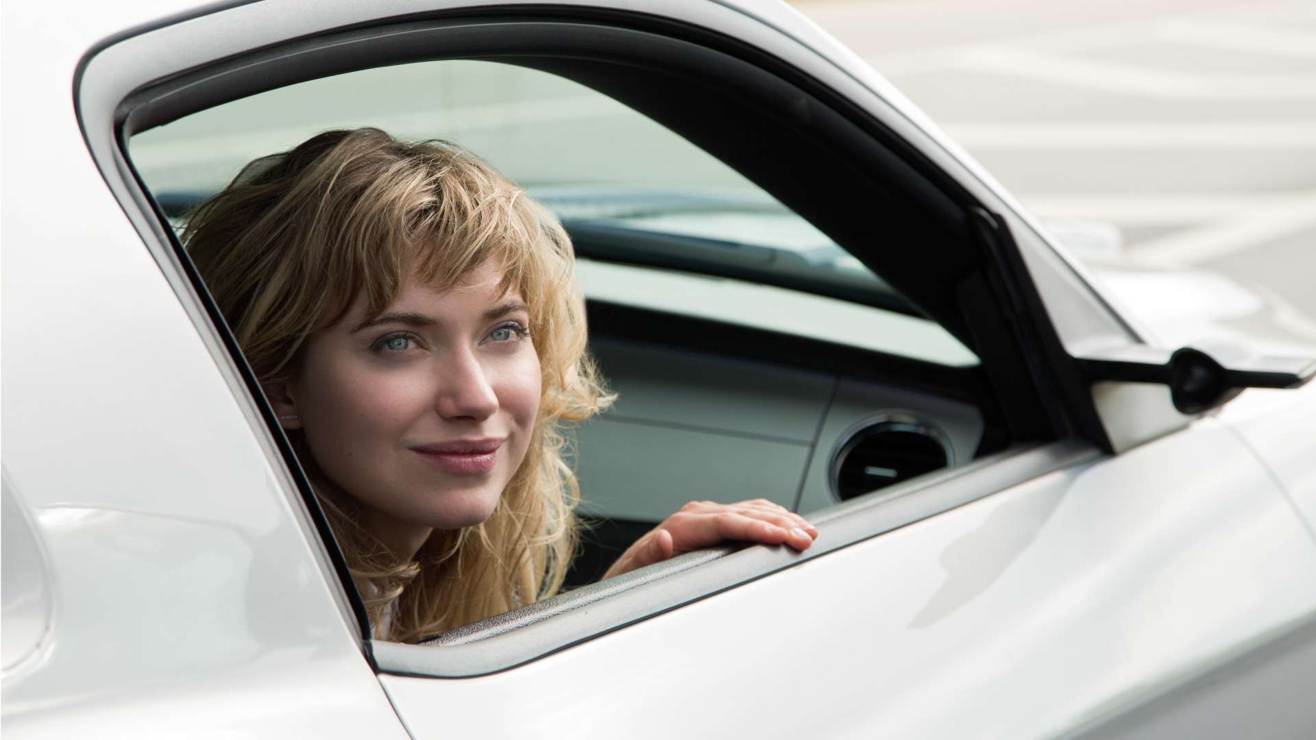 Imogen Poots in a white car HD Wallpaper