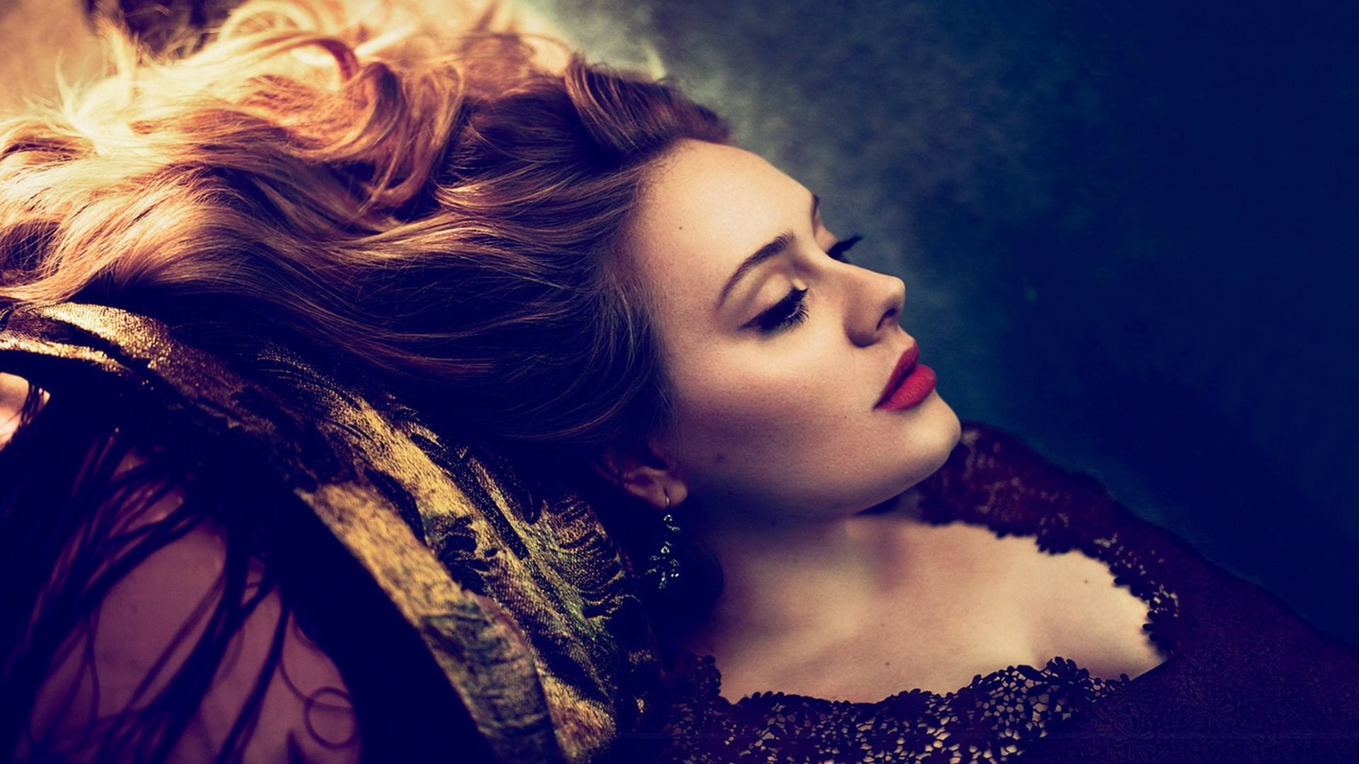 Adele lying down with her hair spread out HD Wallpaper