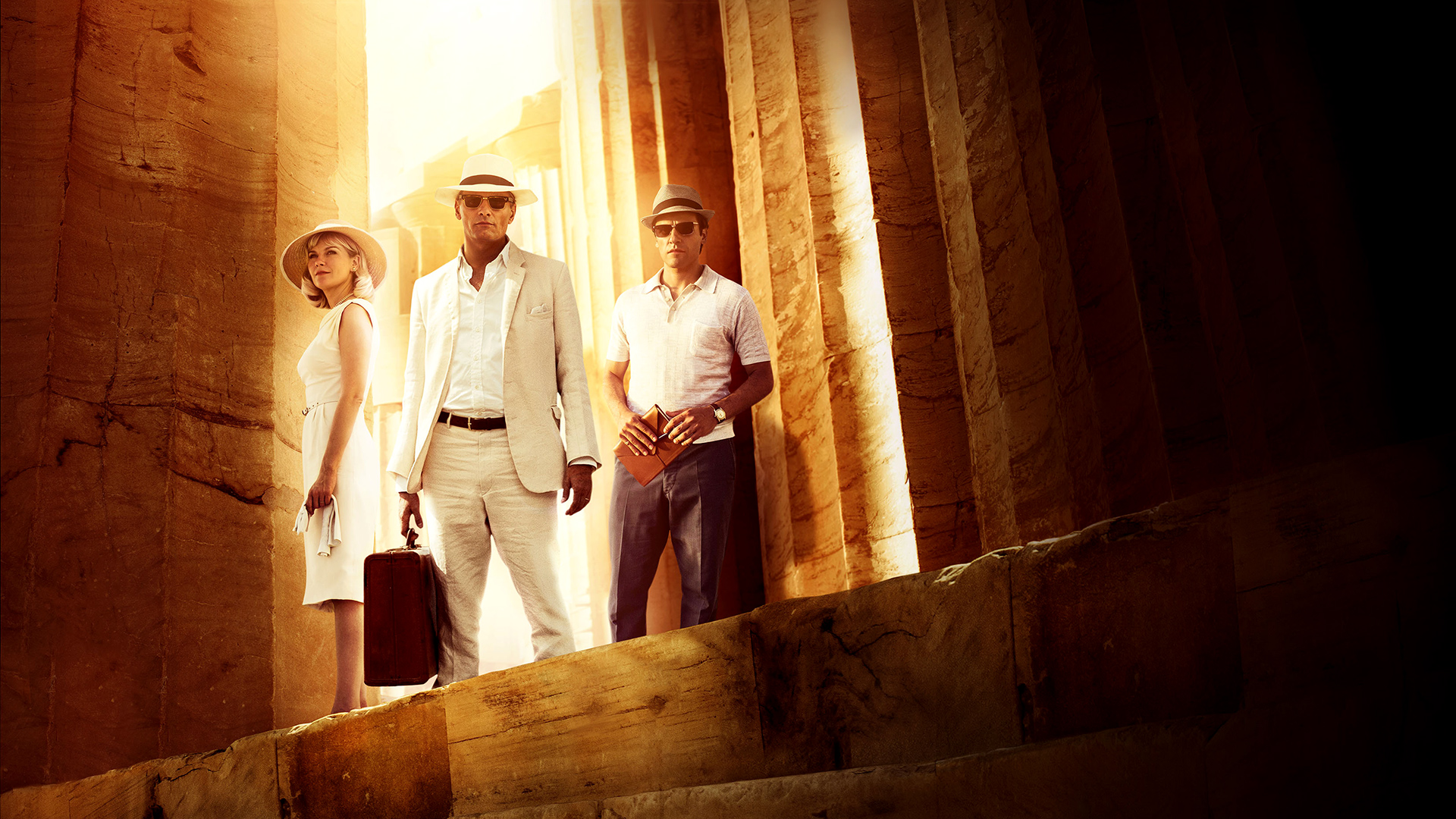 Three people in ancient Egyptian ruins HD Wallpaper