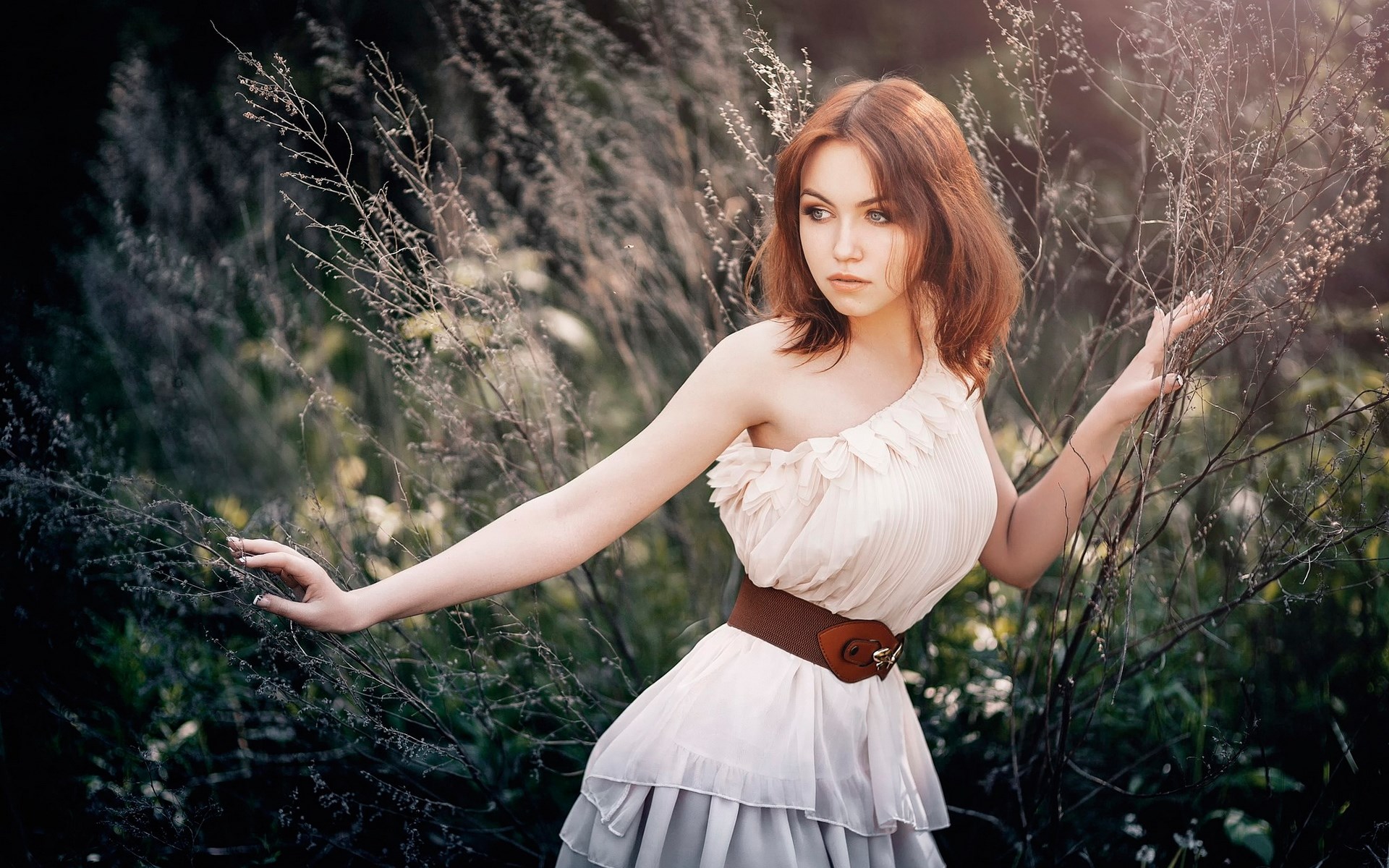 Woman in a dress standing in tall grass HD Wallpaper